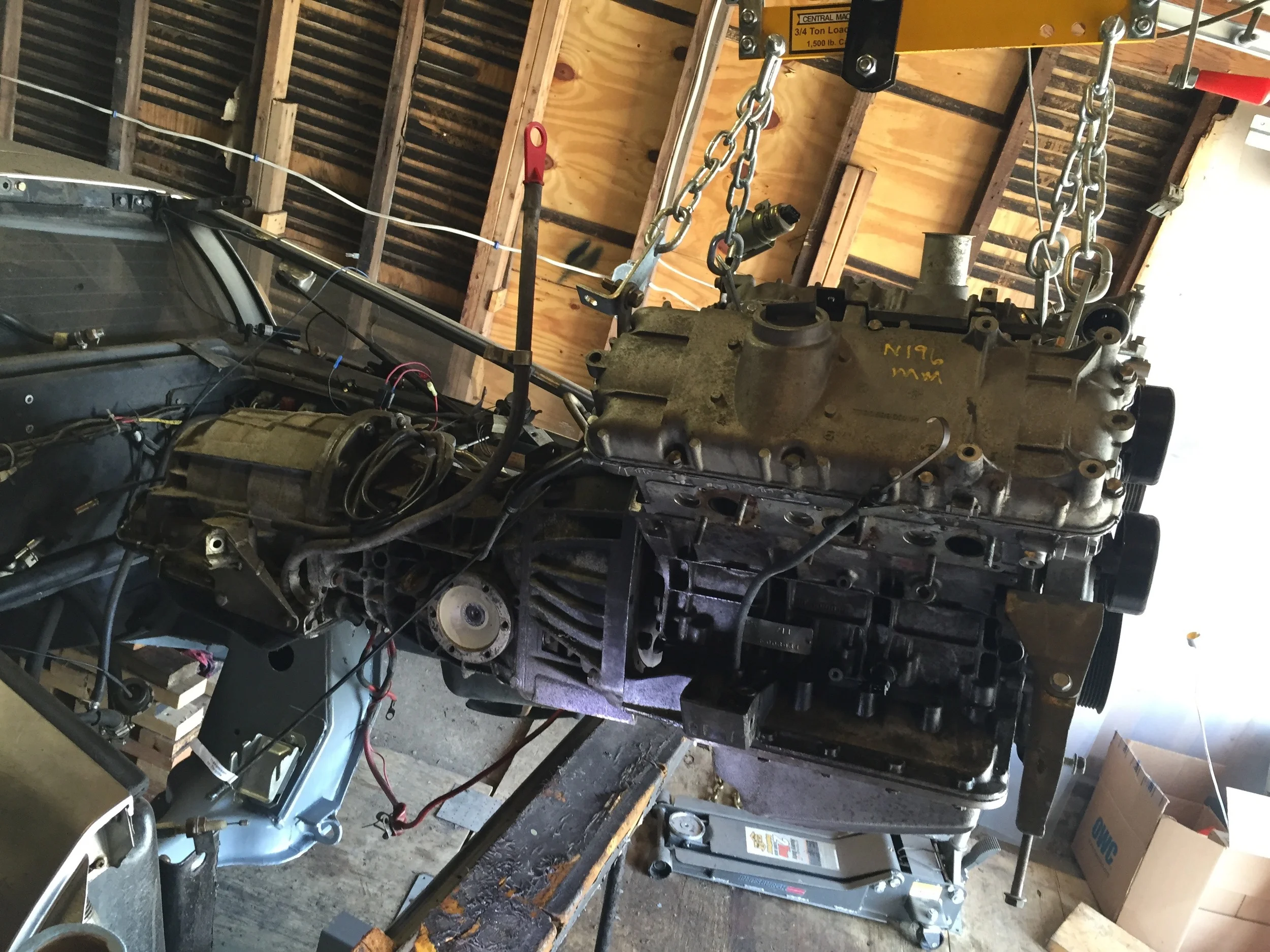 The engine and transmission mostly level over the engine bay.
