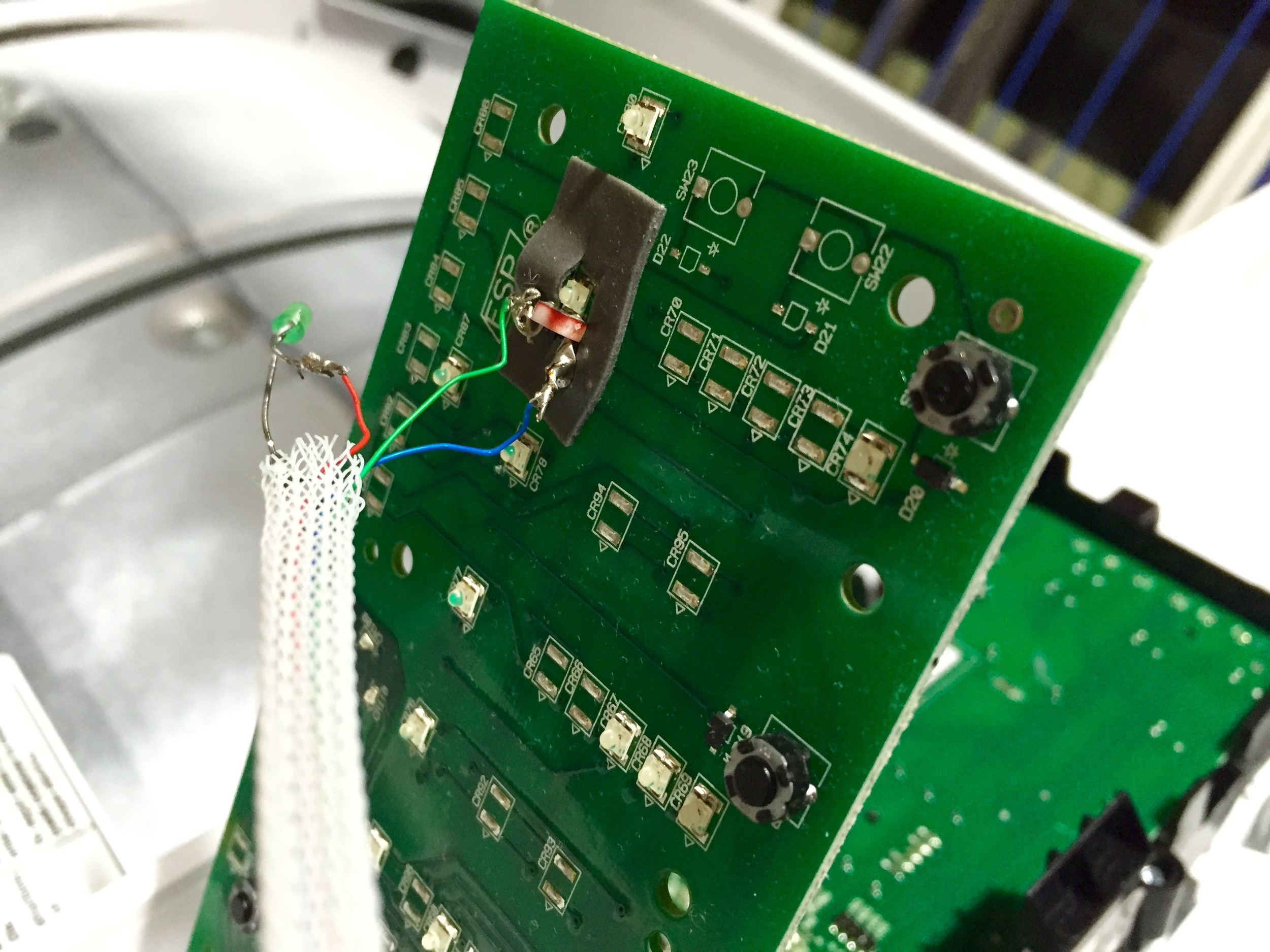 The photocell in position on the dryer board. This was then covered with another piece of VHB tape.