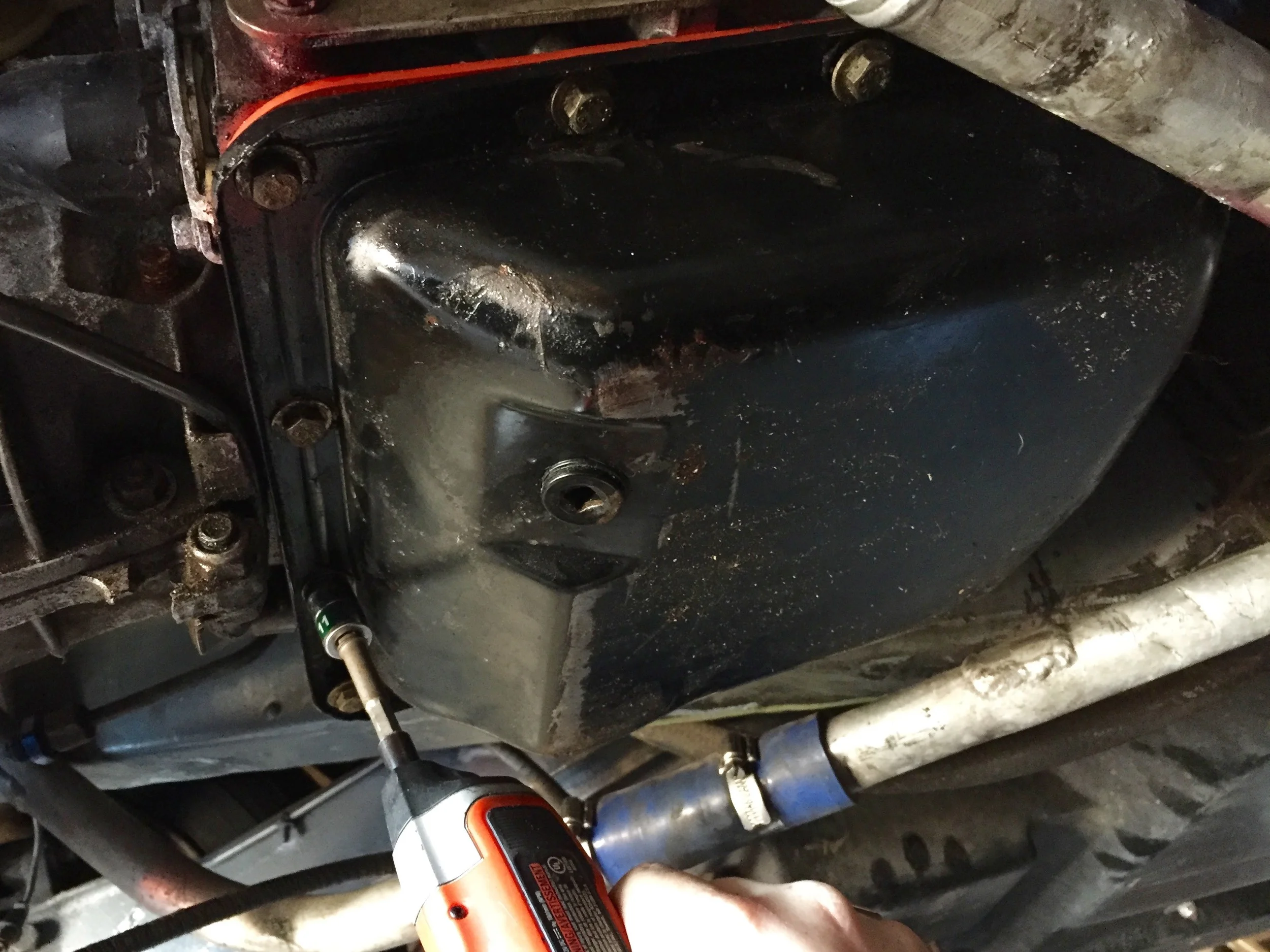 Installing the bolts with an 11mm socket on a power screwdriver.