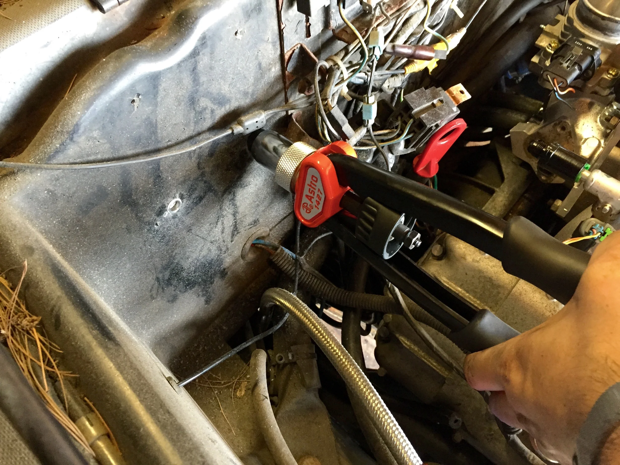 After squeezing the handles together, the rivnut is firmly secured in the firewall and ready for a bolt.