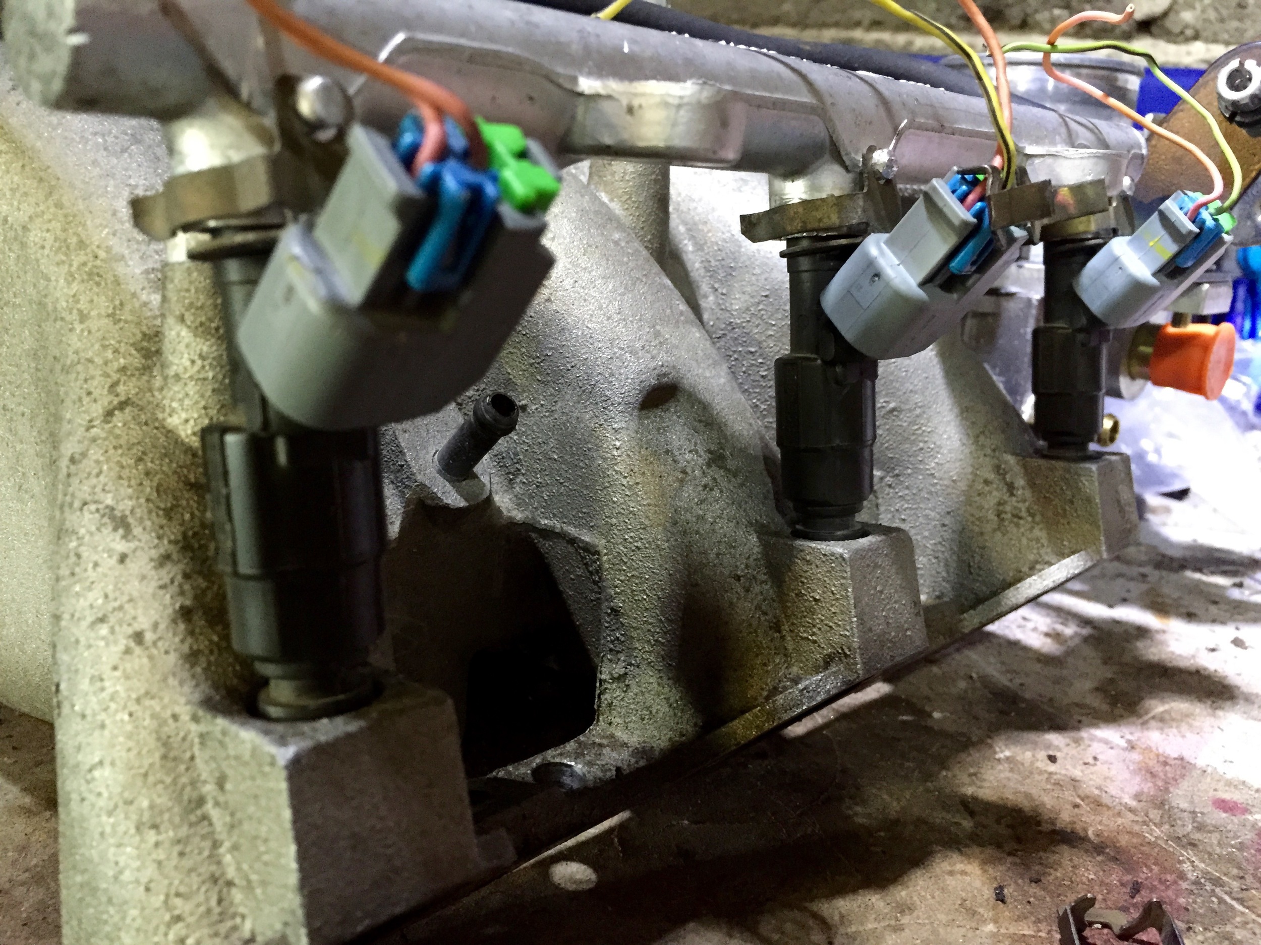 The injectors installed on in the manifold.