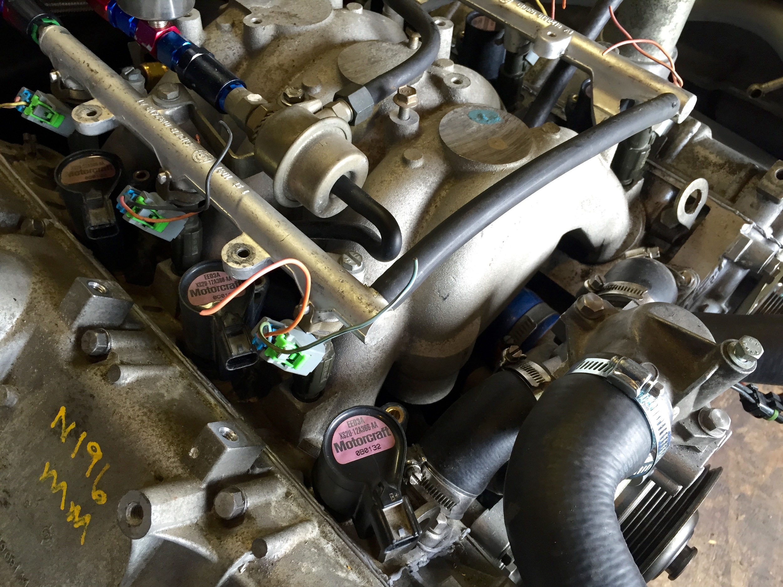 The coil-on-plugs installed in the car.