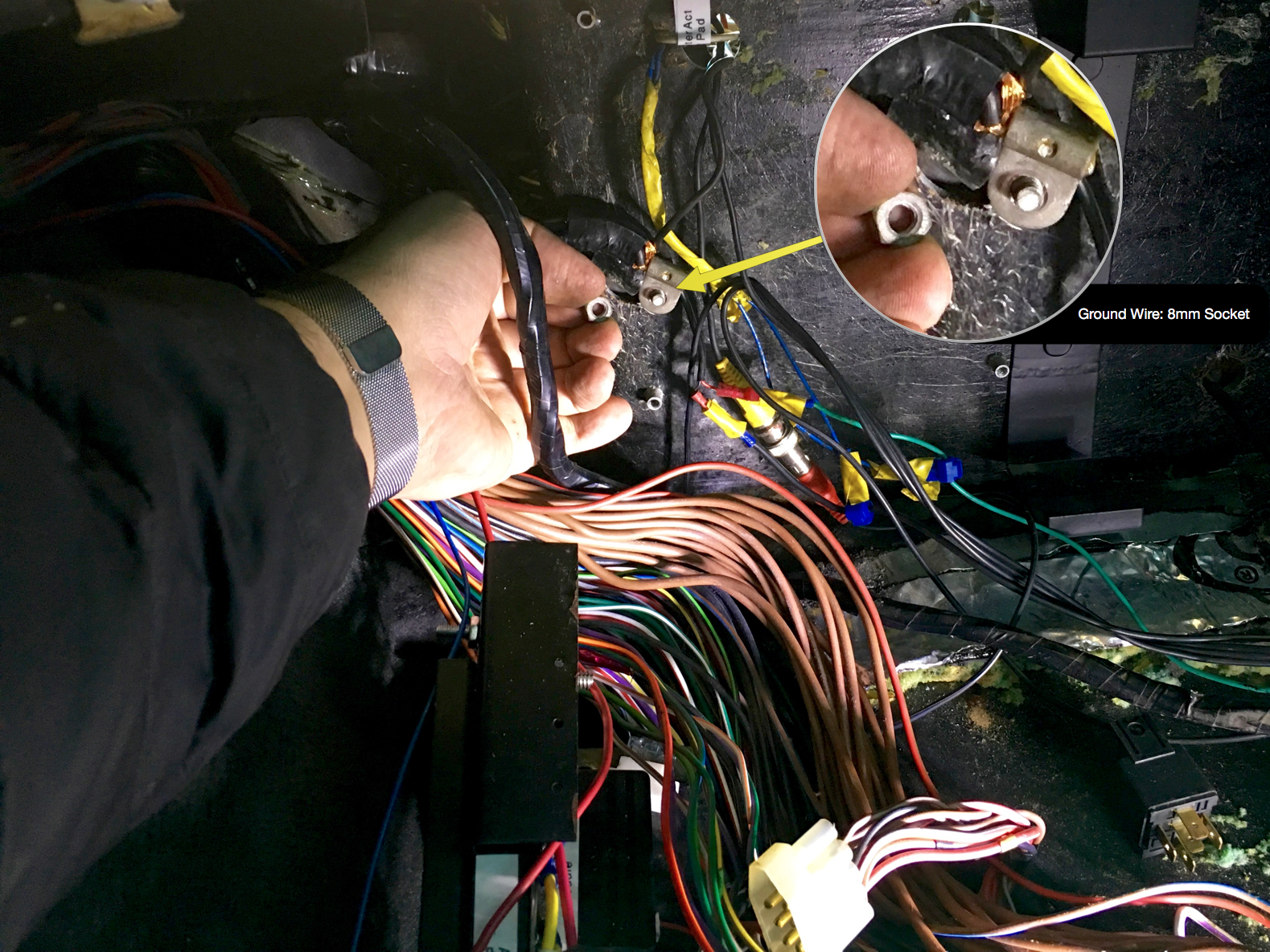 Inside the car, the ground wire can be removed with an 8mm socket.
