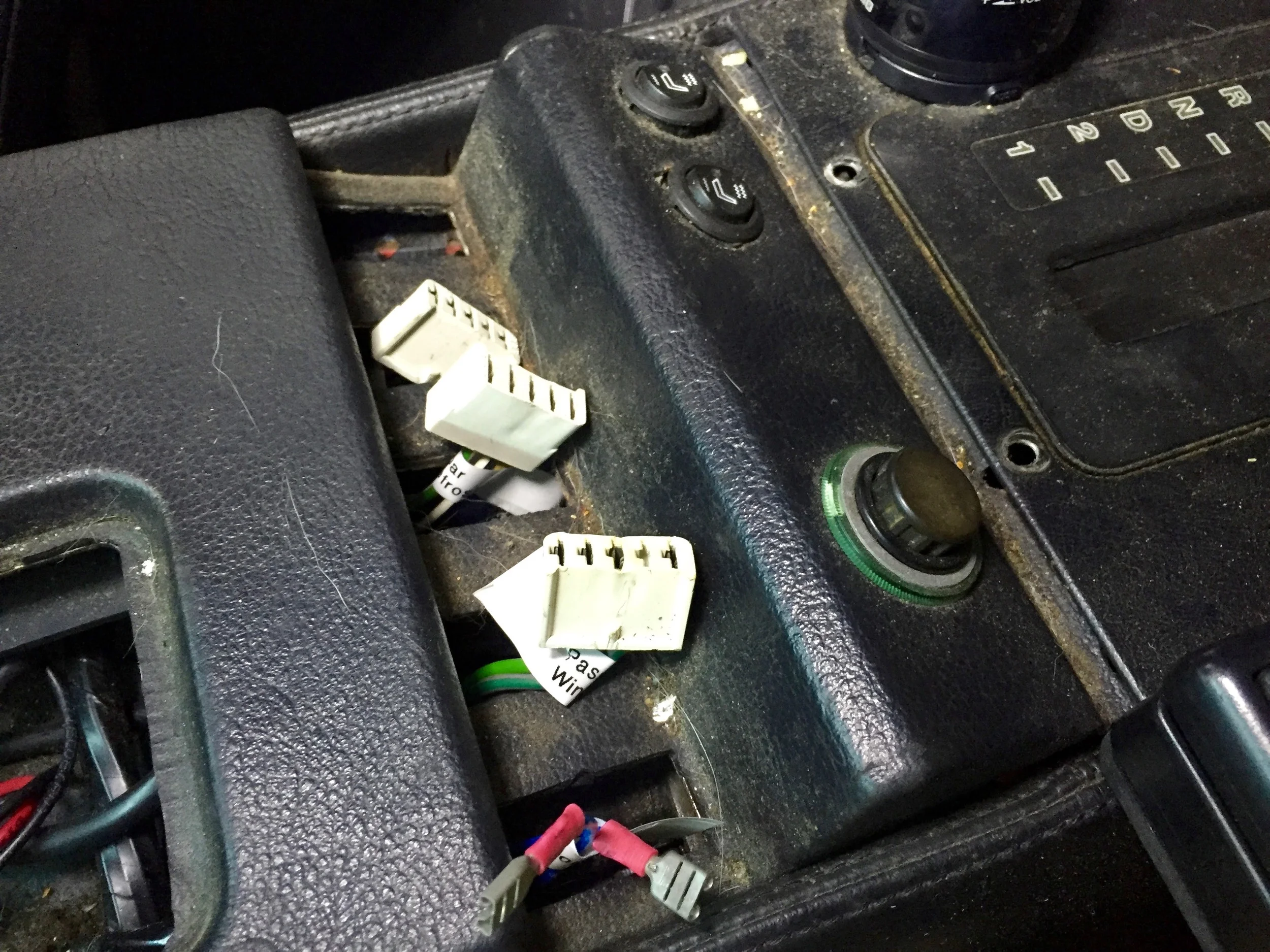 The labeled connectors after removing the switches. The two wires in the bottom switch are aftermarket modifications.