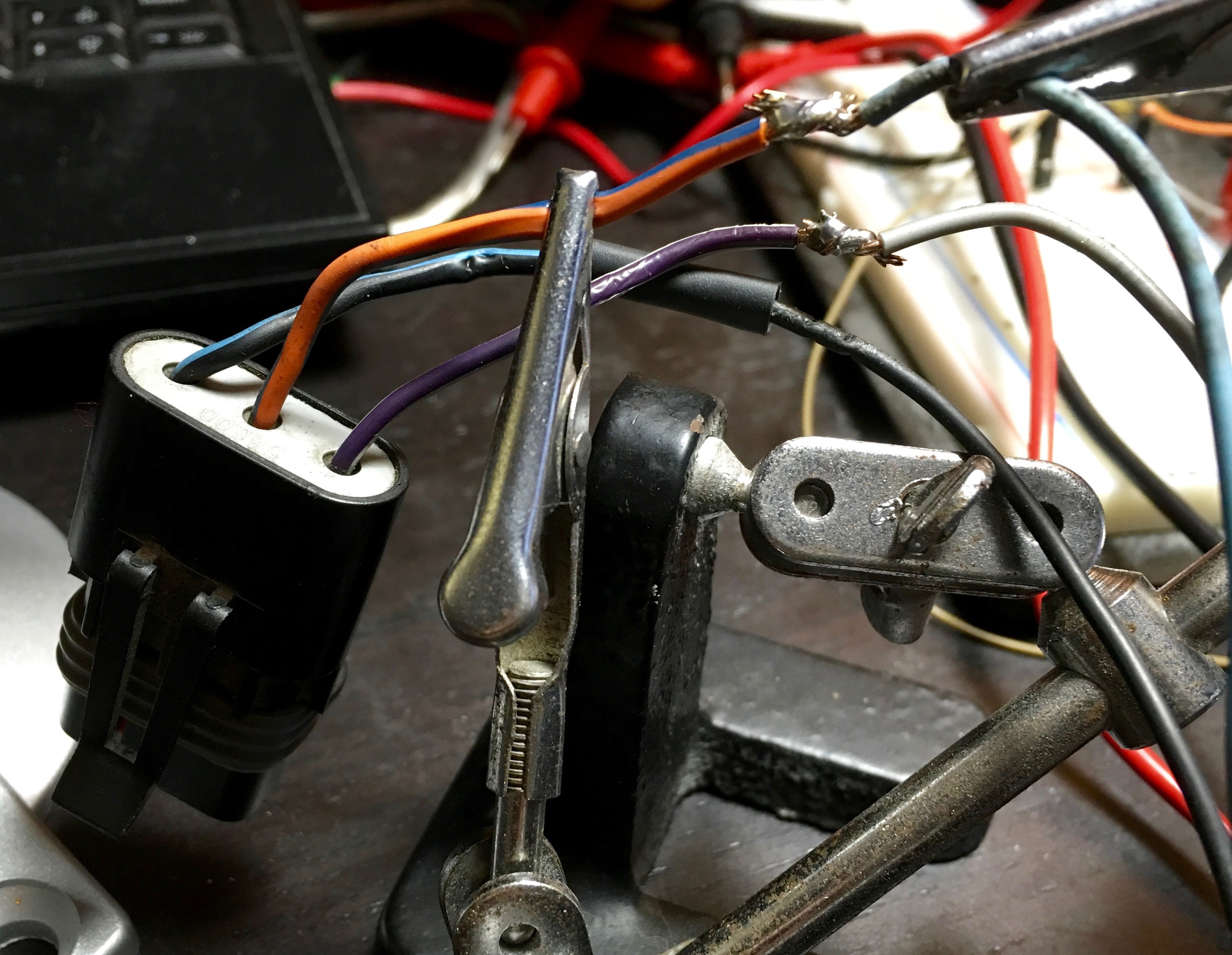 New soldered wires on the throttle position sensor connector.