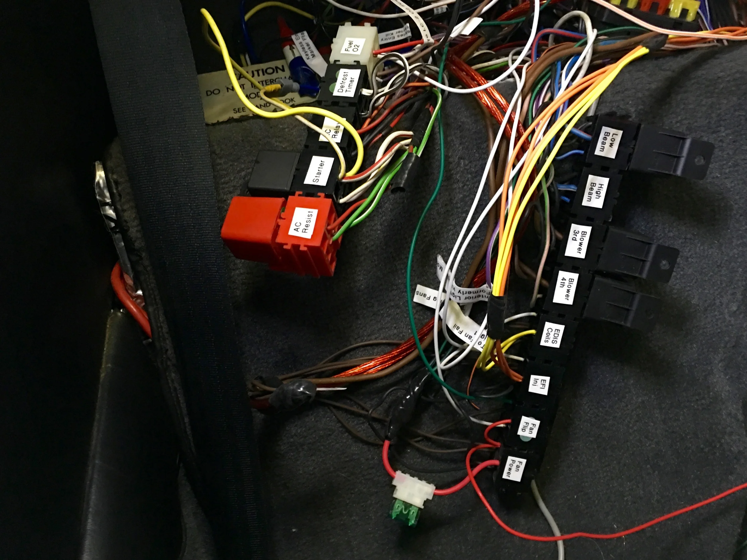 Final relay wiring. The yellow and orange wires run to the fuse box behind the driver's seat. The inline fuse holder protects the fans and avoids an extra run to the new fuse box. This does not include the LC-2 power relay, which was added later.