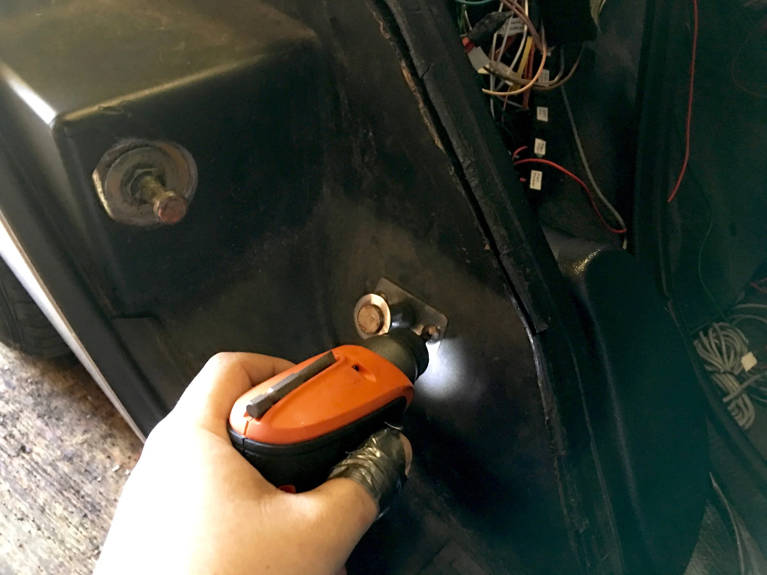 The kicker, if installed, is held in with two philips screws.