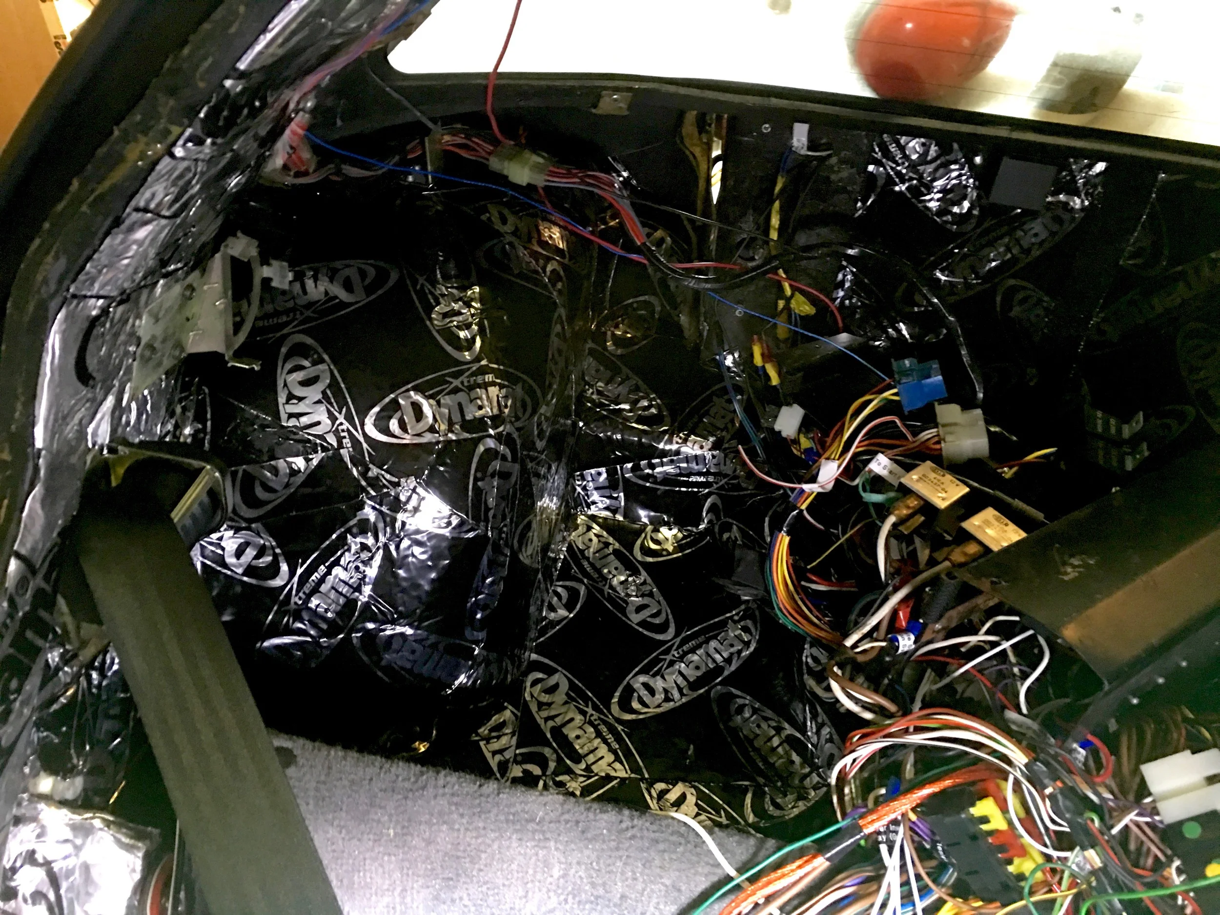 Completed passenger side electronics tray area.