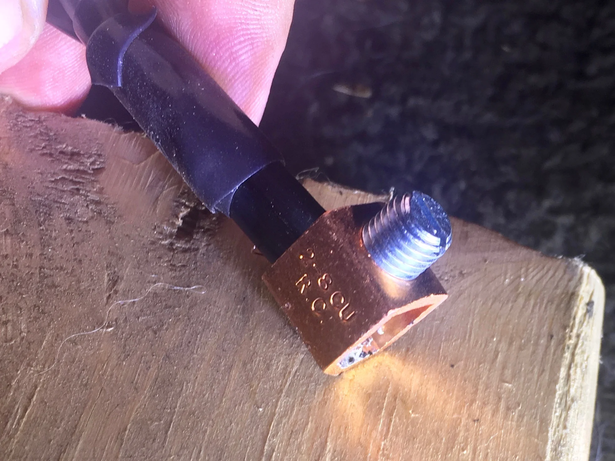 The pair of 10 gauge wires soldered to a 2 gauge lug.