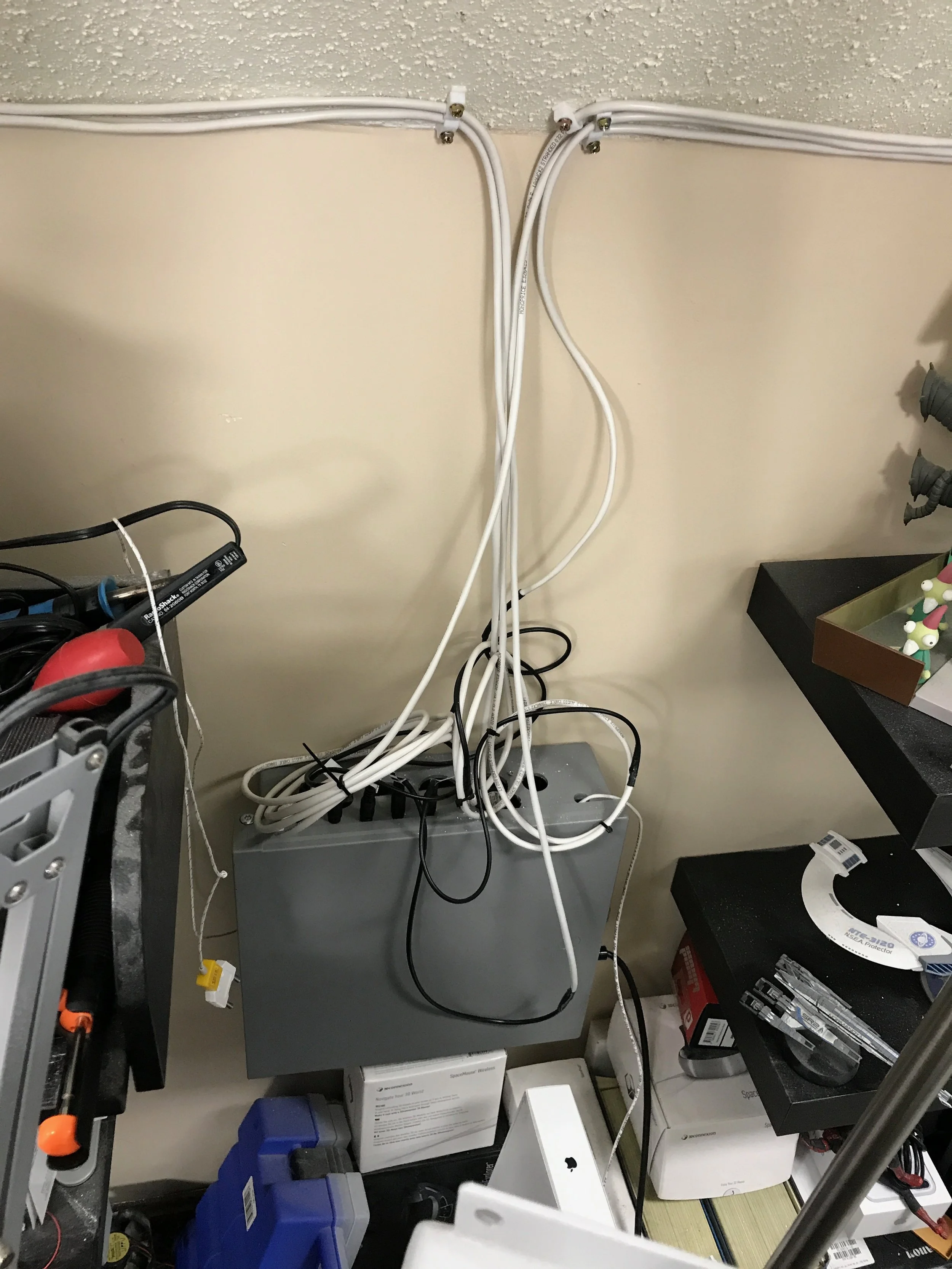 The final installation of the electronics box. It's not exactly pretty, but it's hidden in a corner where it's not seen. The cables can all be easily unplugged for maintenance.