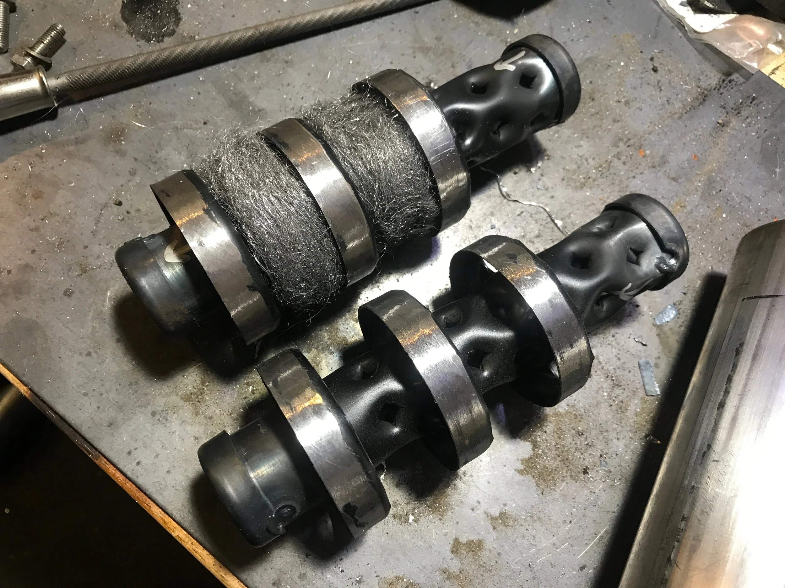 The two Car Chemistry silencer inserts, one packed with stainless steel wool, and one without packing. I wound up using less than this in the final installation, as I wasn't sure how much was too much.