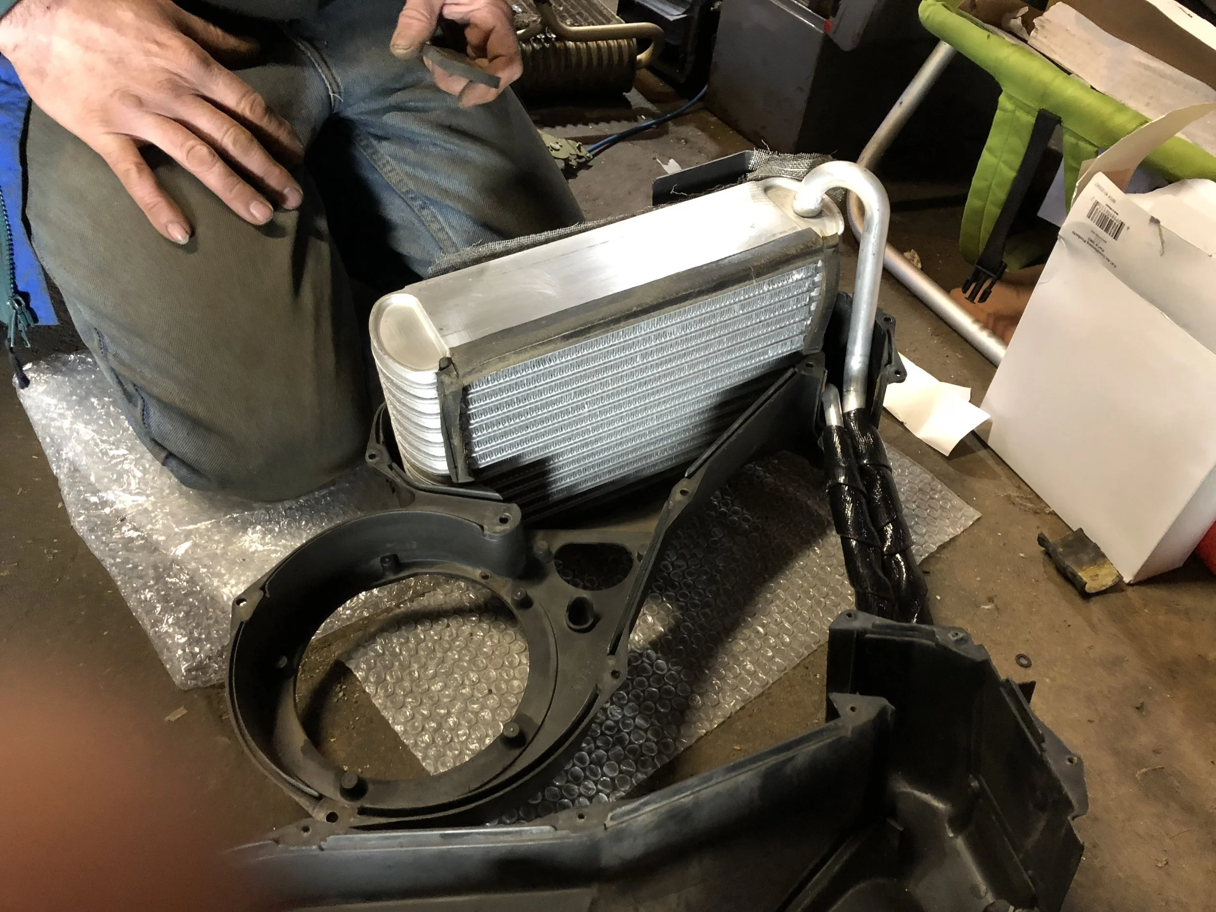 The evaporator installed in the bottom of the box, ready to be reassembled around it.