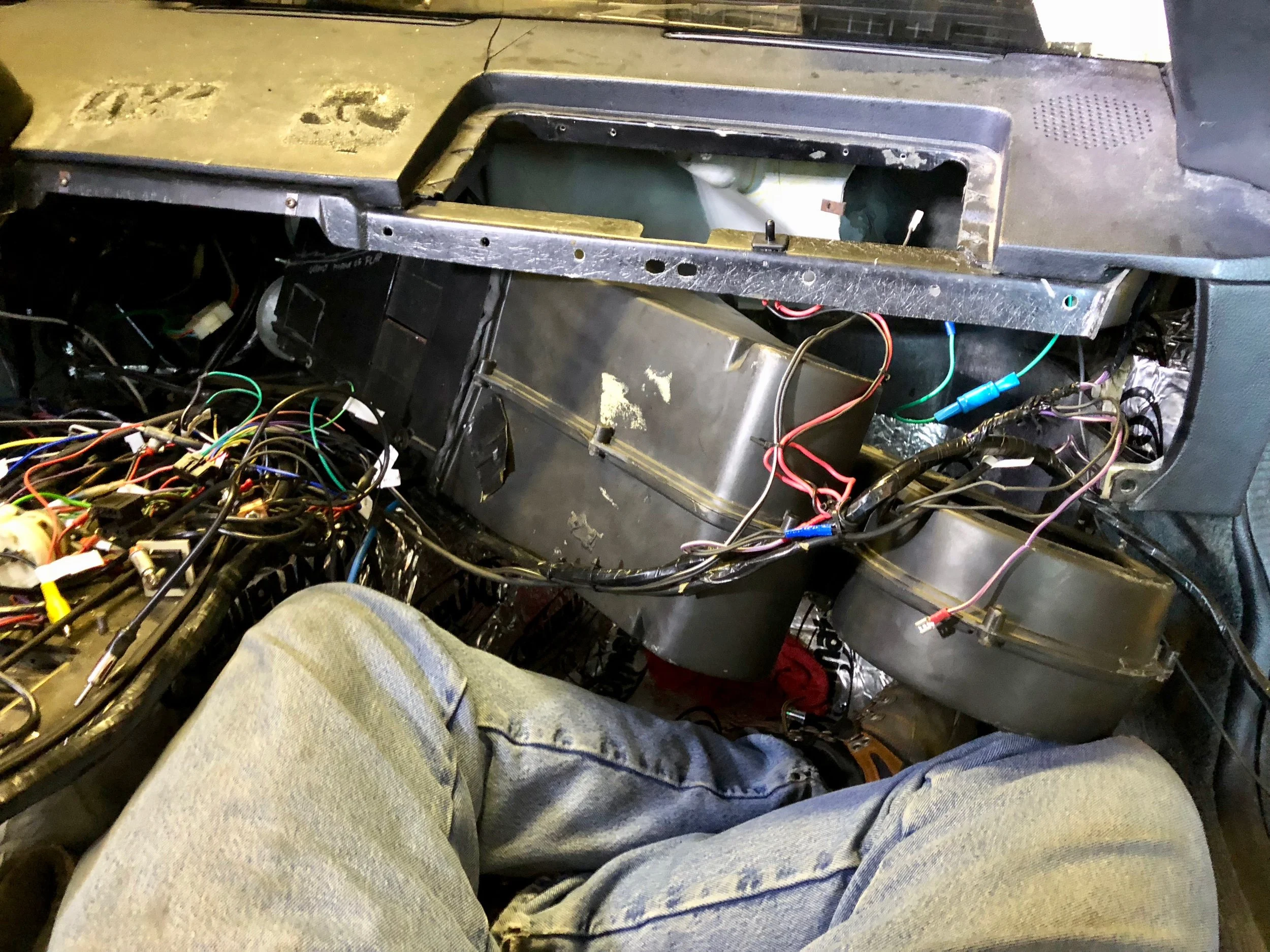 Tilting the box into the car.