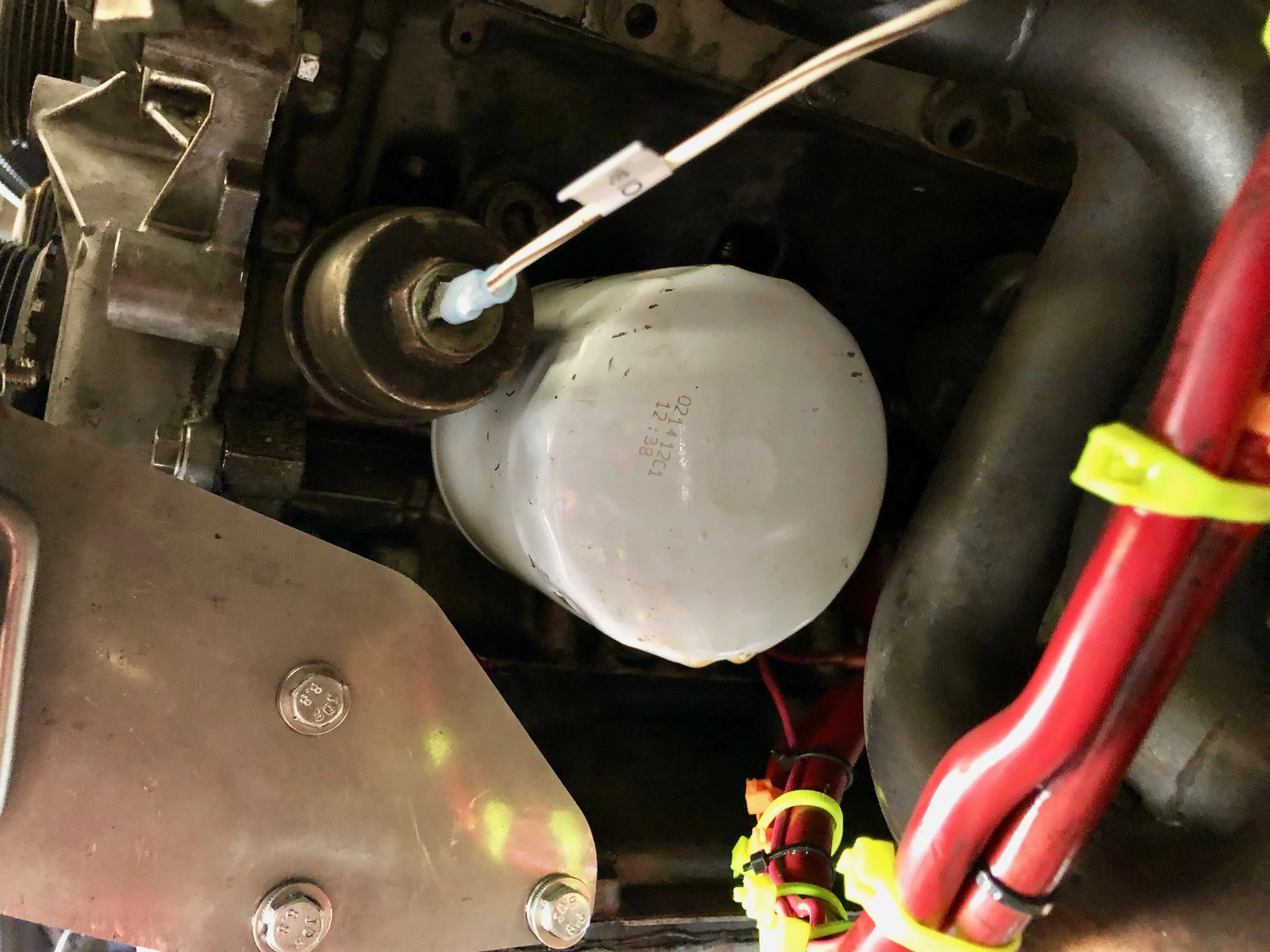 The sender just barely fits next to the oil filter.
