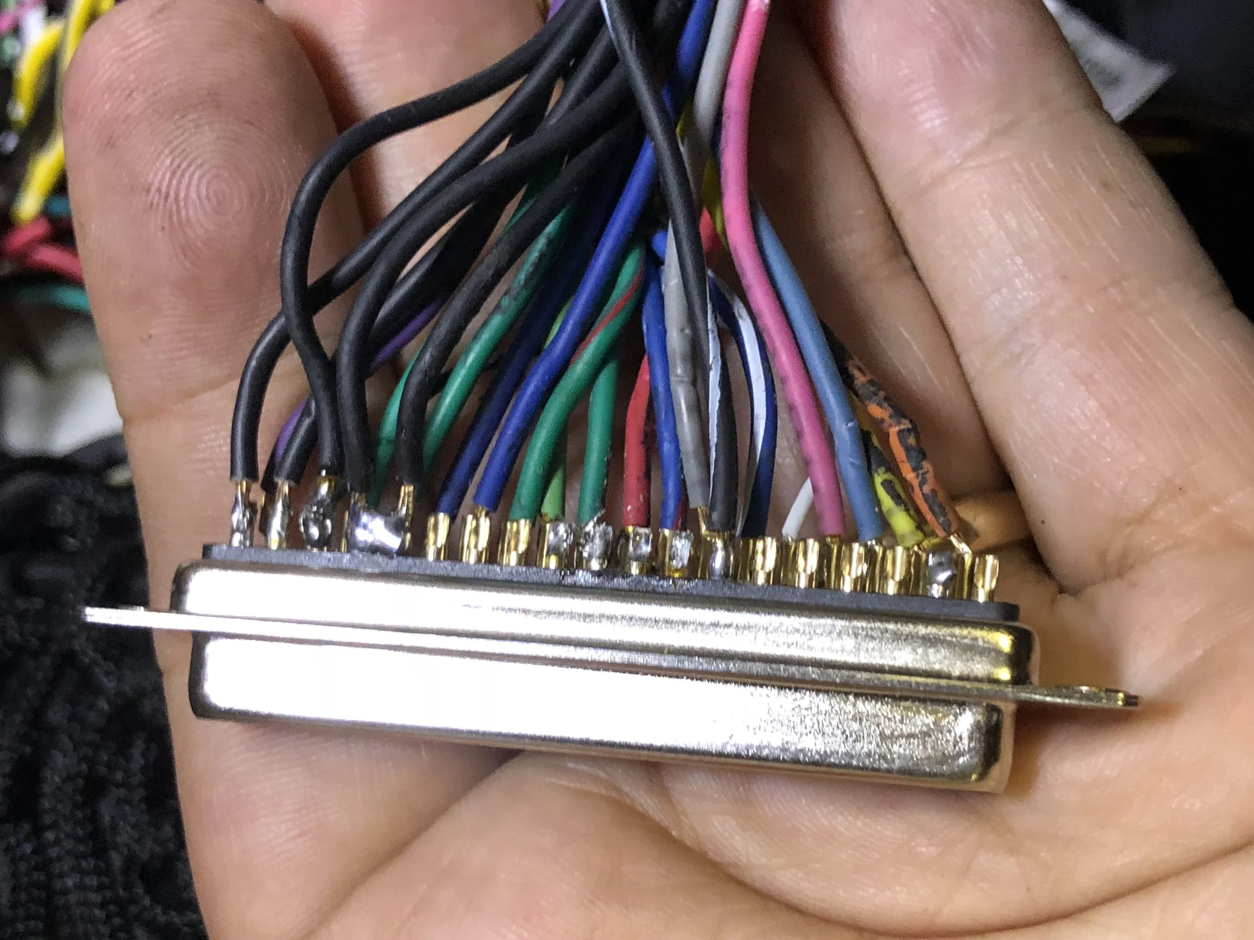 The grounds correctly wired. Two of the pins are soldered to each other, but that doesn't matter because they're all grounds. All five of the pins would be wired to each other and it would be fine, electrically.
