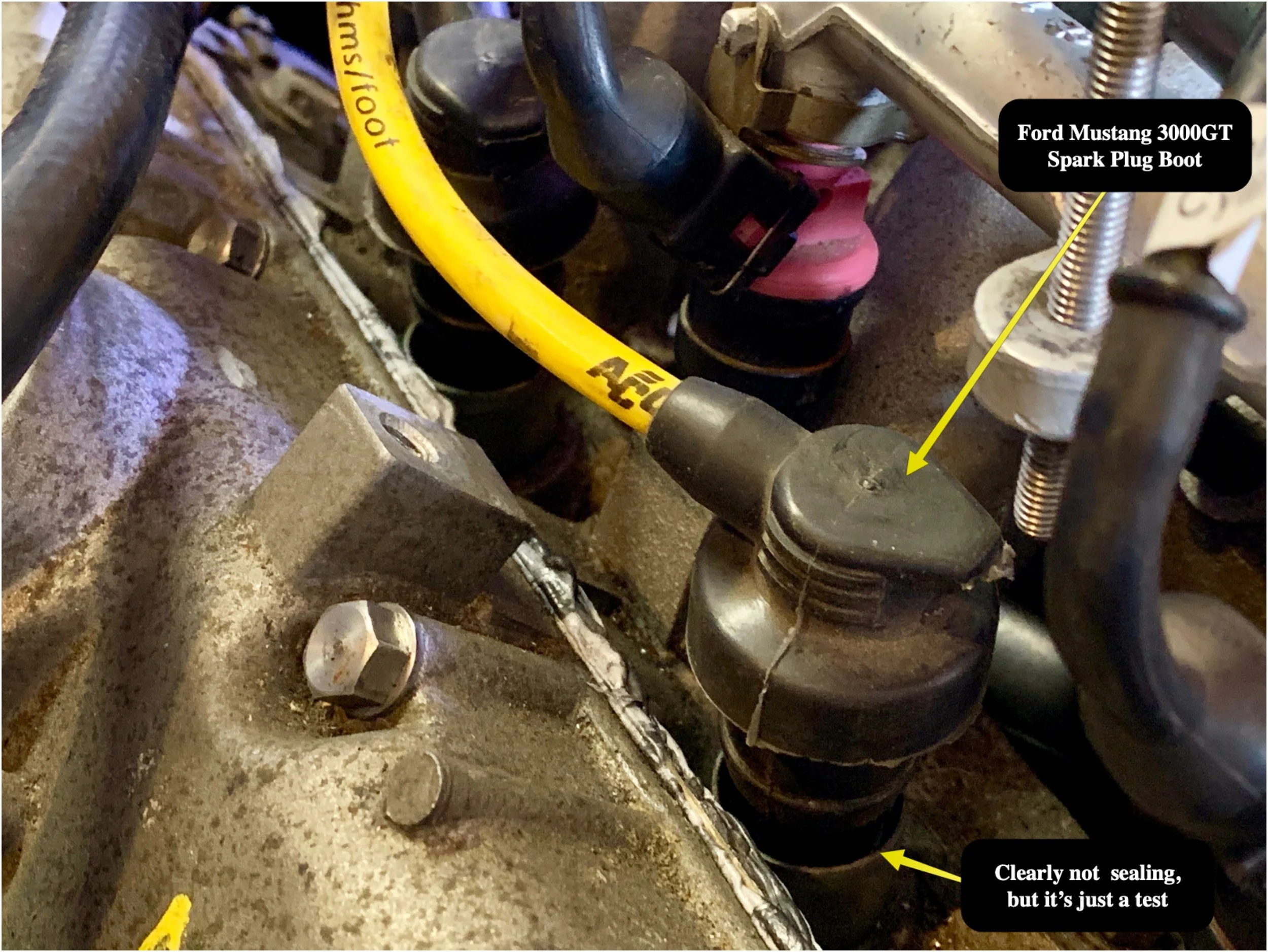 The 3000GT plugs fit just fine in the 3.0L engine’s spark plug ports, although they don’t seal properly. It’s fine for testing purposes, though.