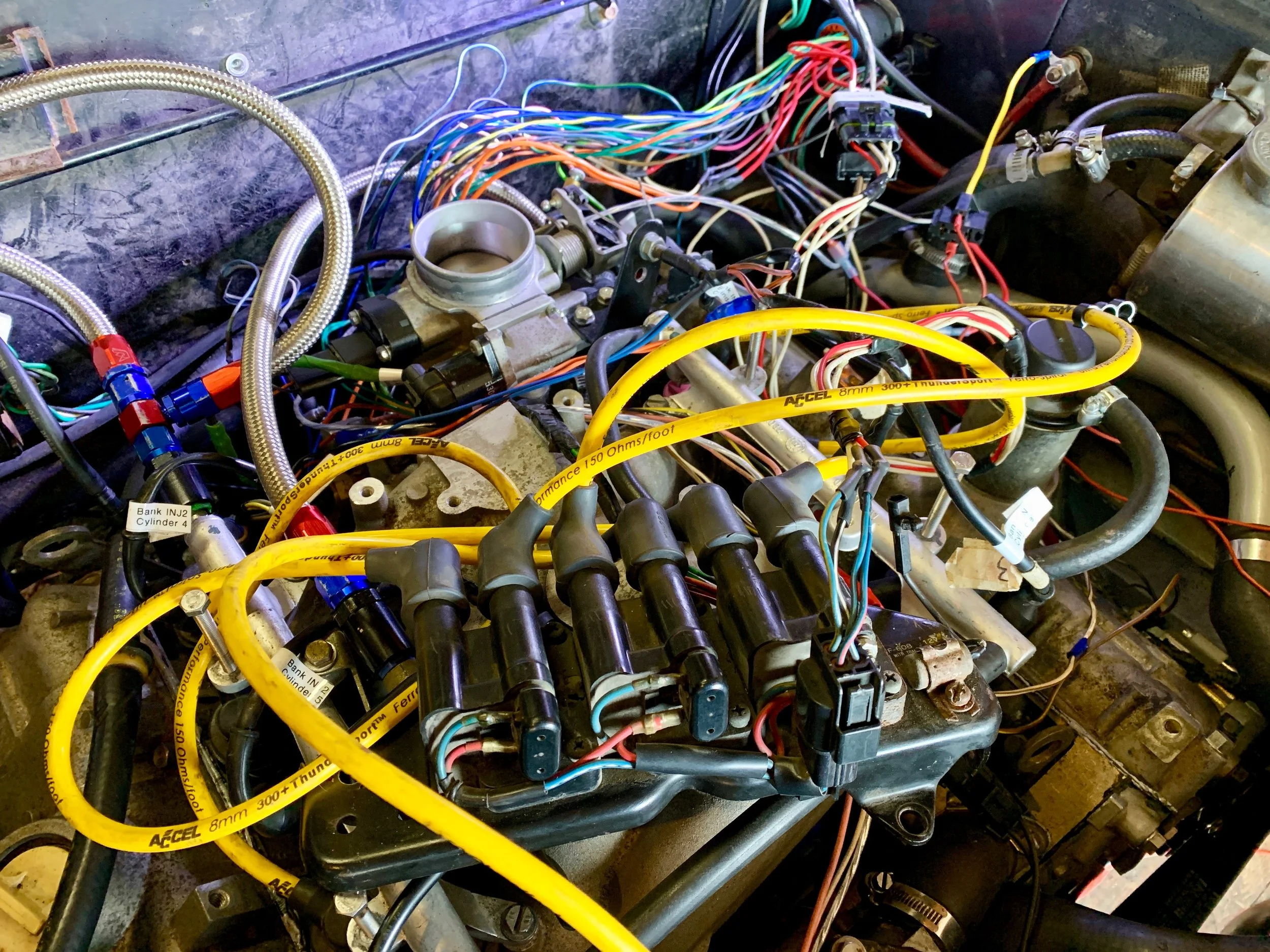 The coil pack unceremoniously plunked down on top of the intake manifold for testing purposes.