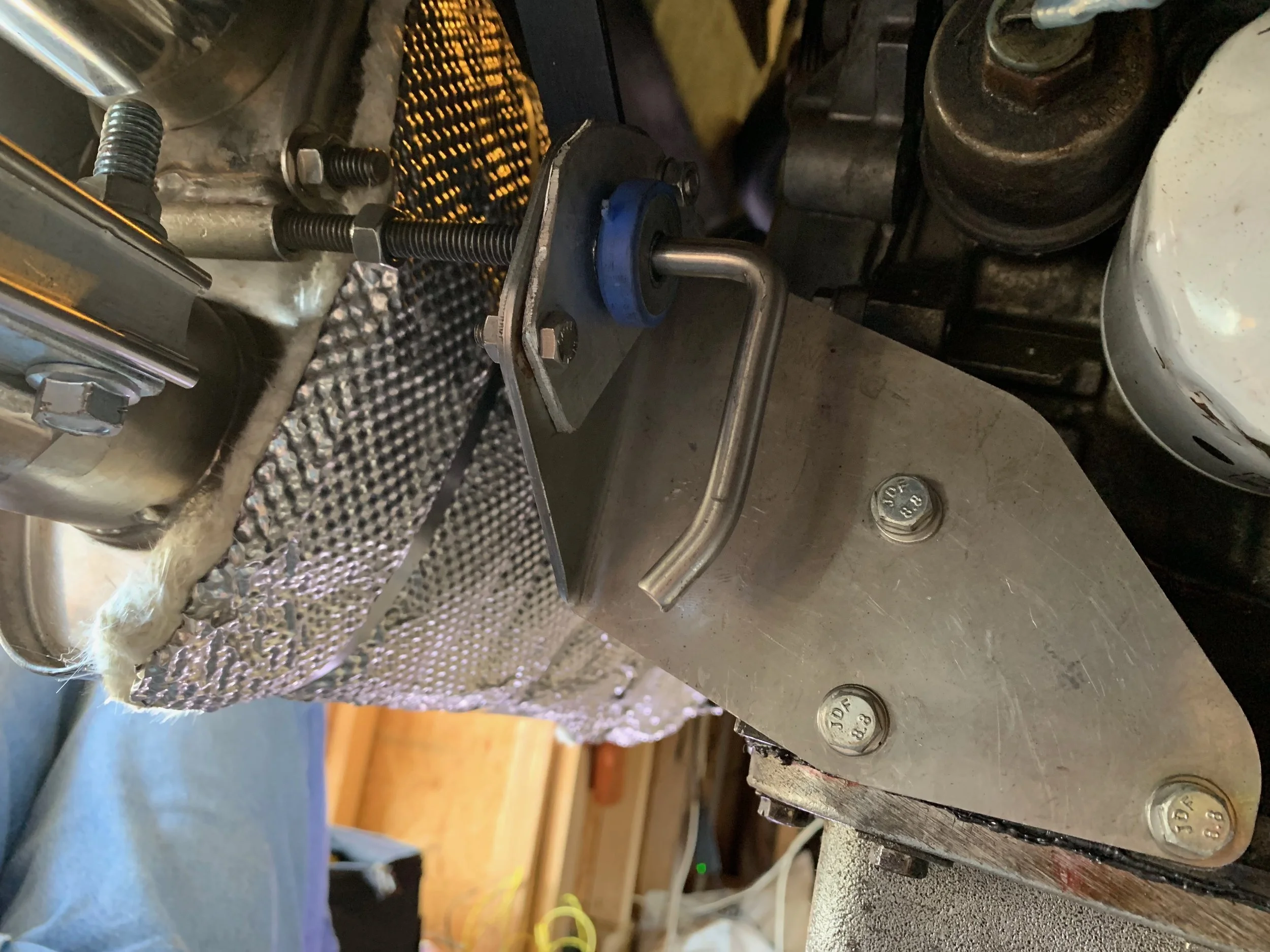 Mounting the adaptor to the back of the bracket ensured this would never happen again (the hanger nut still has to be tightened in this picture).