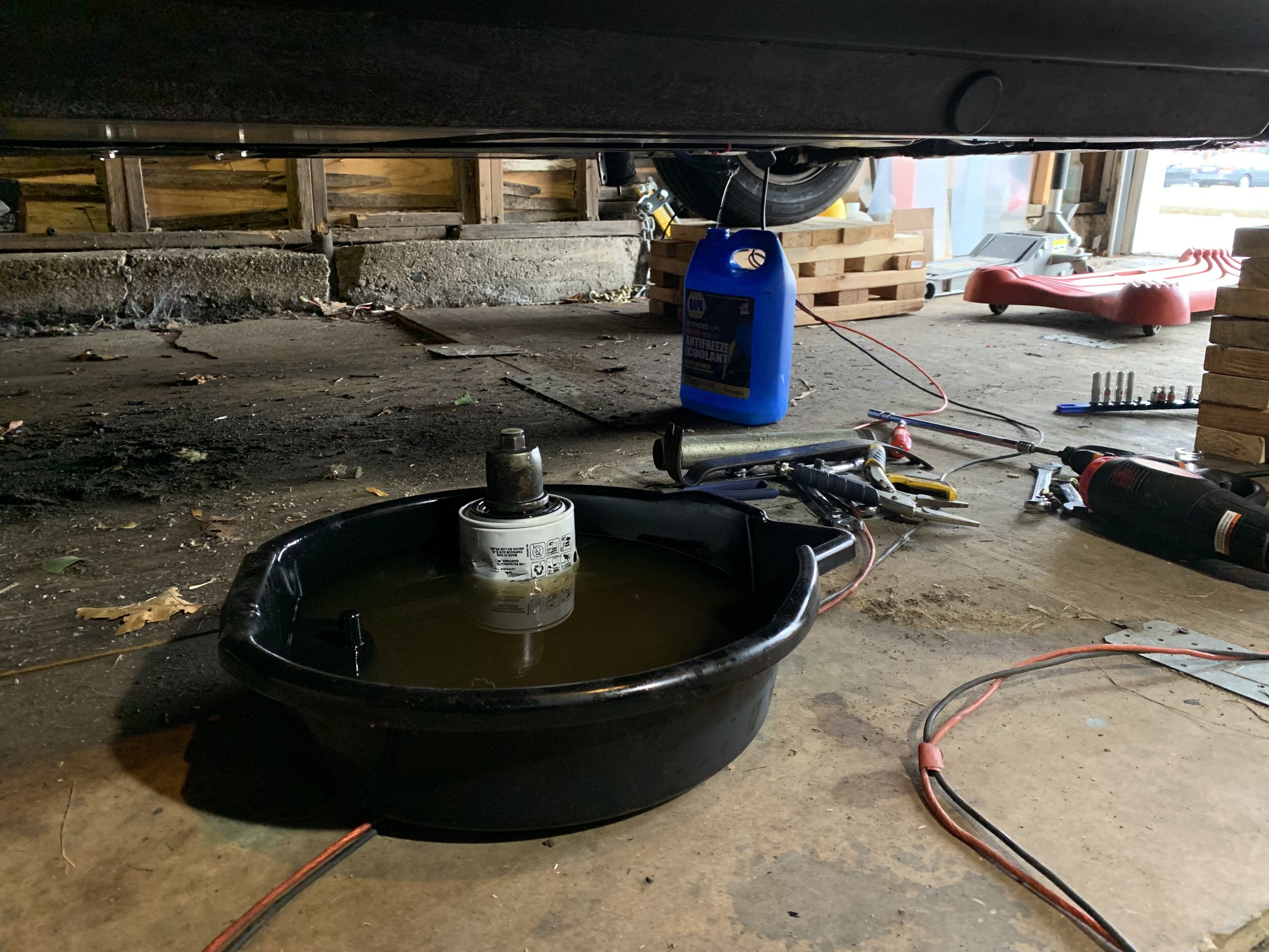 And I do mean a lot — it was more than a gallon when I was done. That oil pan had a little bit of oil in it — the rest was gas.