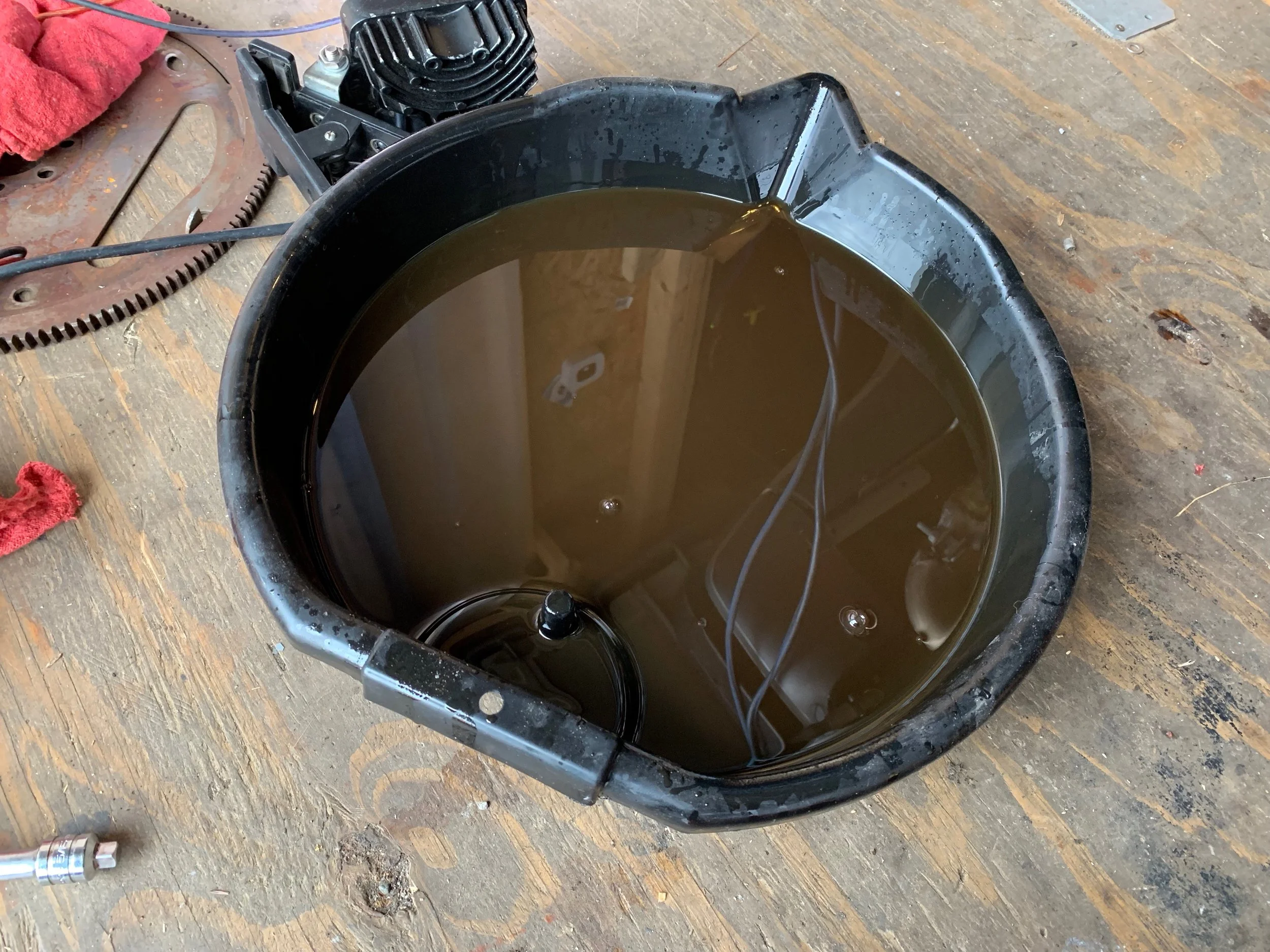 The rather brown looking fluid removed from the transmission. There was a coating of oil in this pan, so it’s probably not that brown, but still. It smelled burned, though.