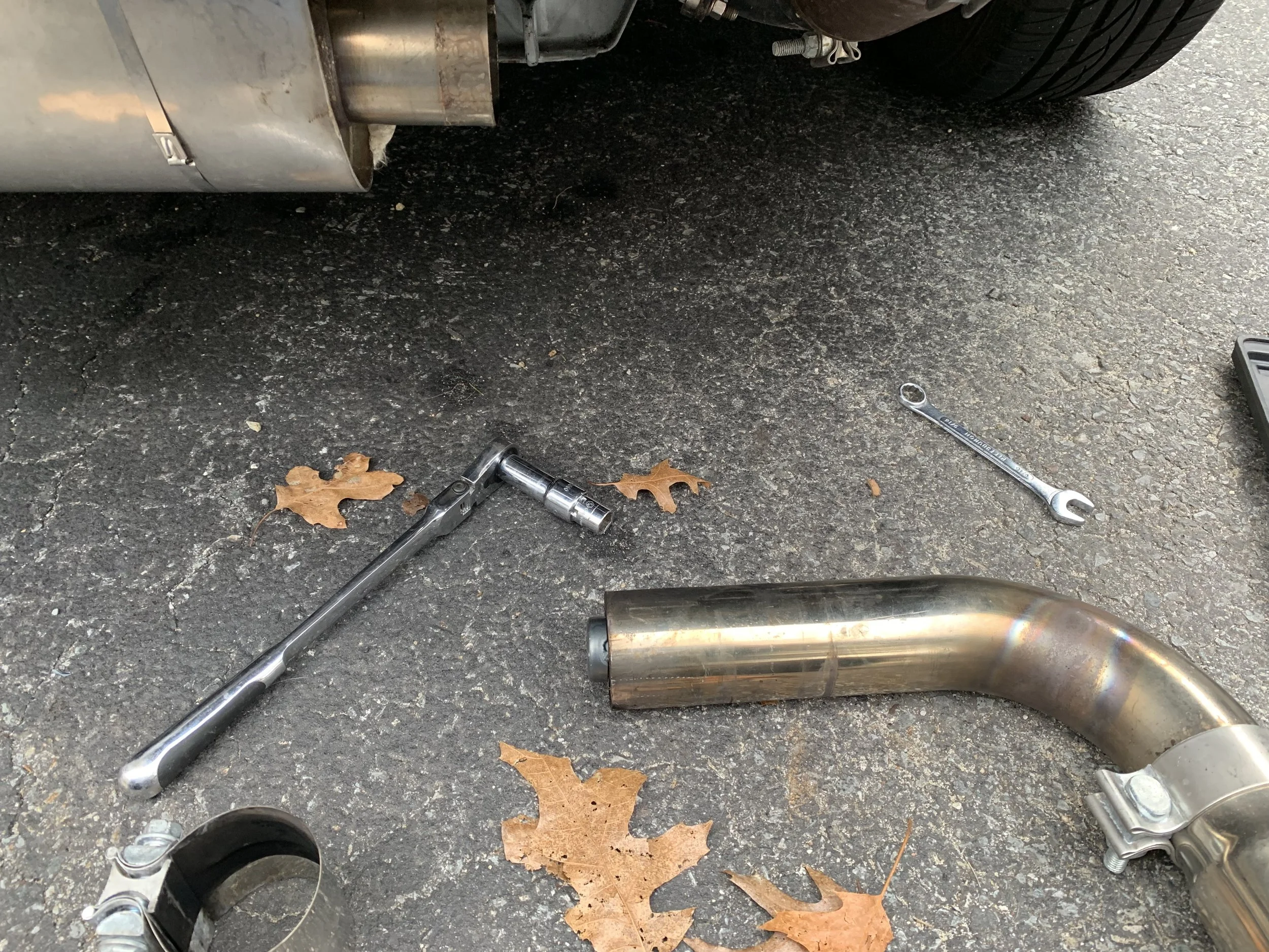 A couple of wrenches were needed to drop the passenger side pipe, but the driver’s side required removing the fascia due to the unusual configuration I have.