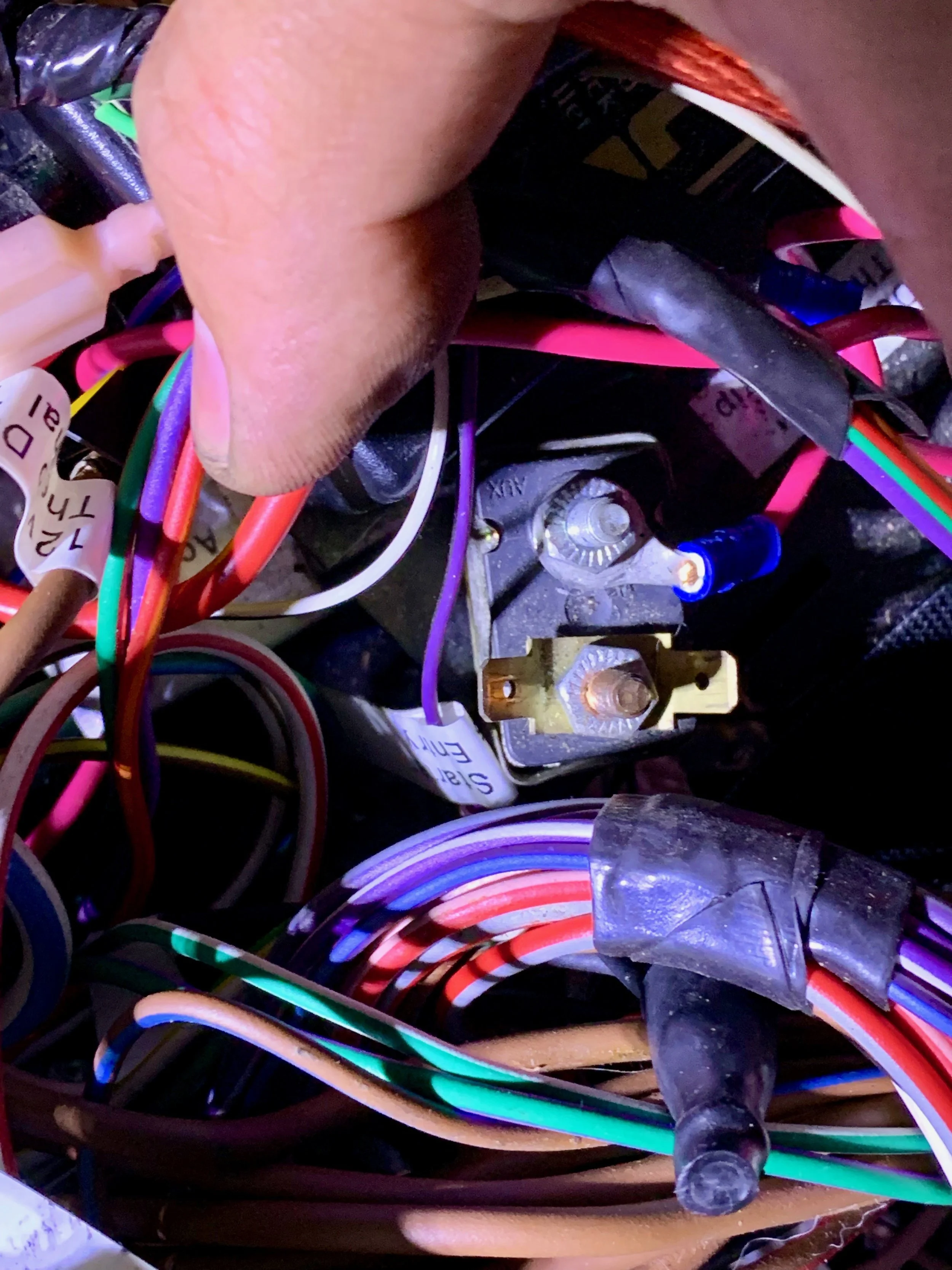 The circuit breaker that is likely energizing the entire tray. The door lock wire is unplugged here.