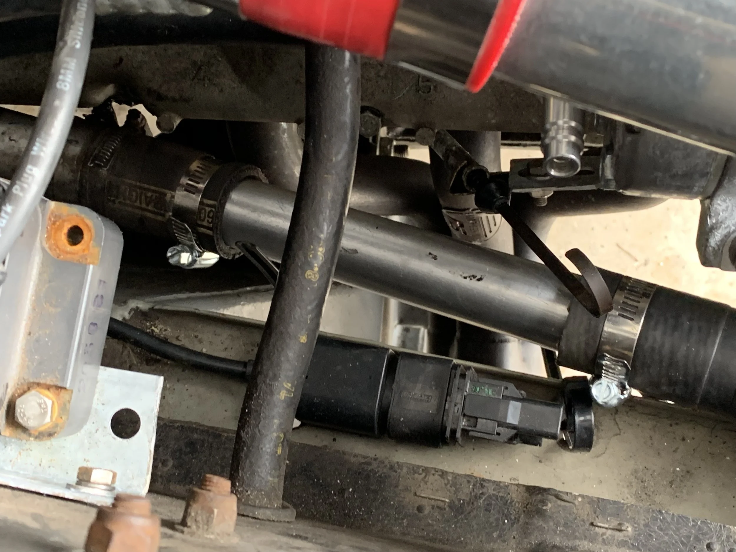 The nice new pipe installed on the line, complete with brand new hose clamps.