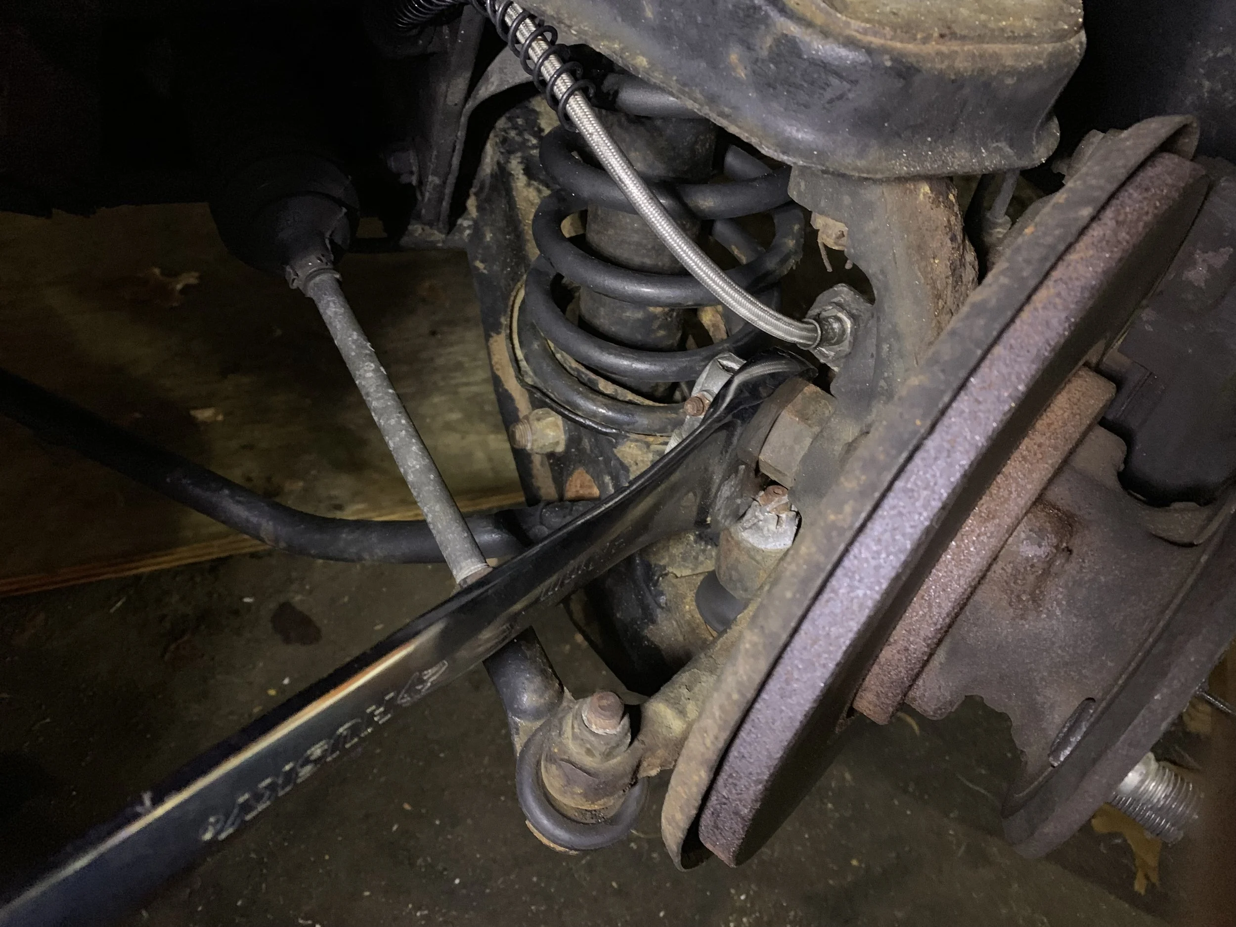 An open end wrench is used to remove the nut on the back, and to pull off the angle drive with it.