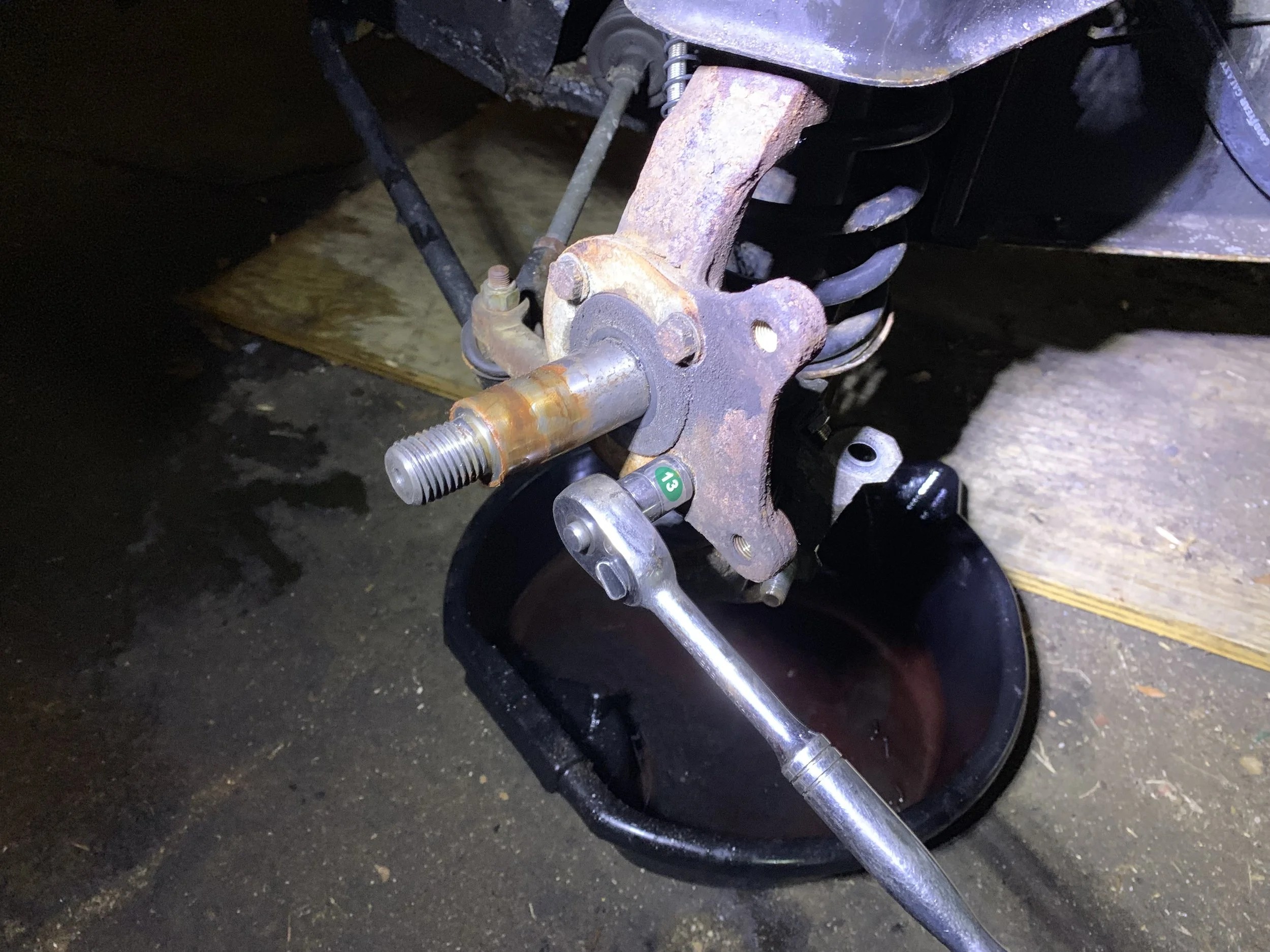 Reinstalling the dust shield bolts without the shield.