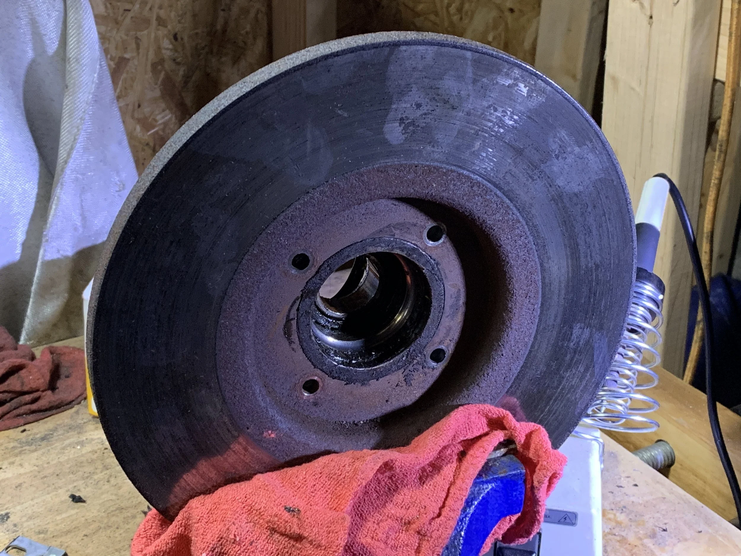 The bolts are removed, but the hub is still tightly secured.