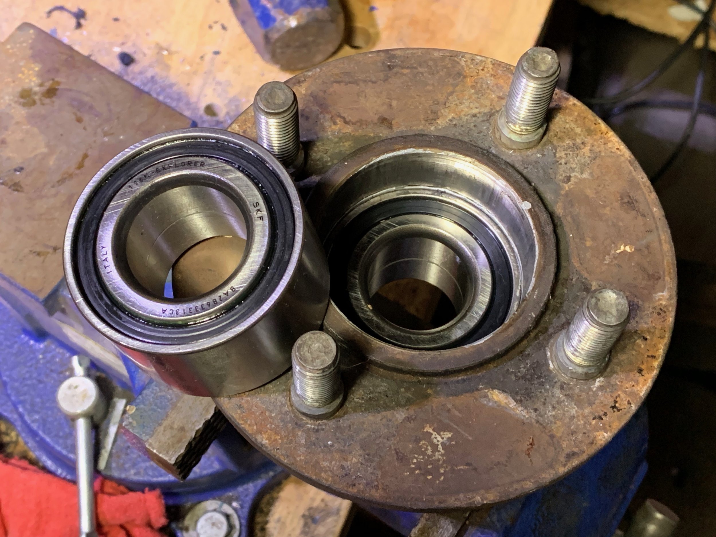 The new bearing fully pressed in, with the other bearing ready to go for the other hub.