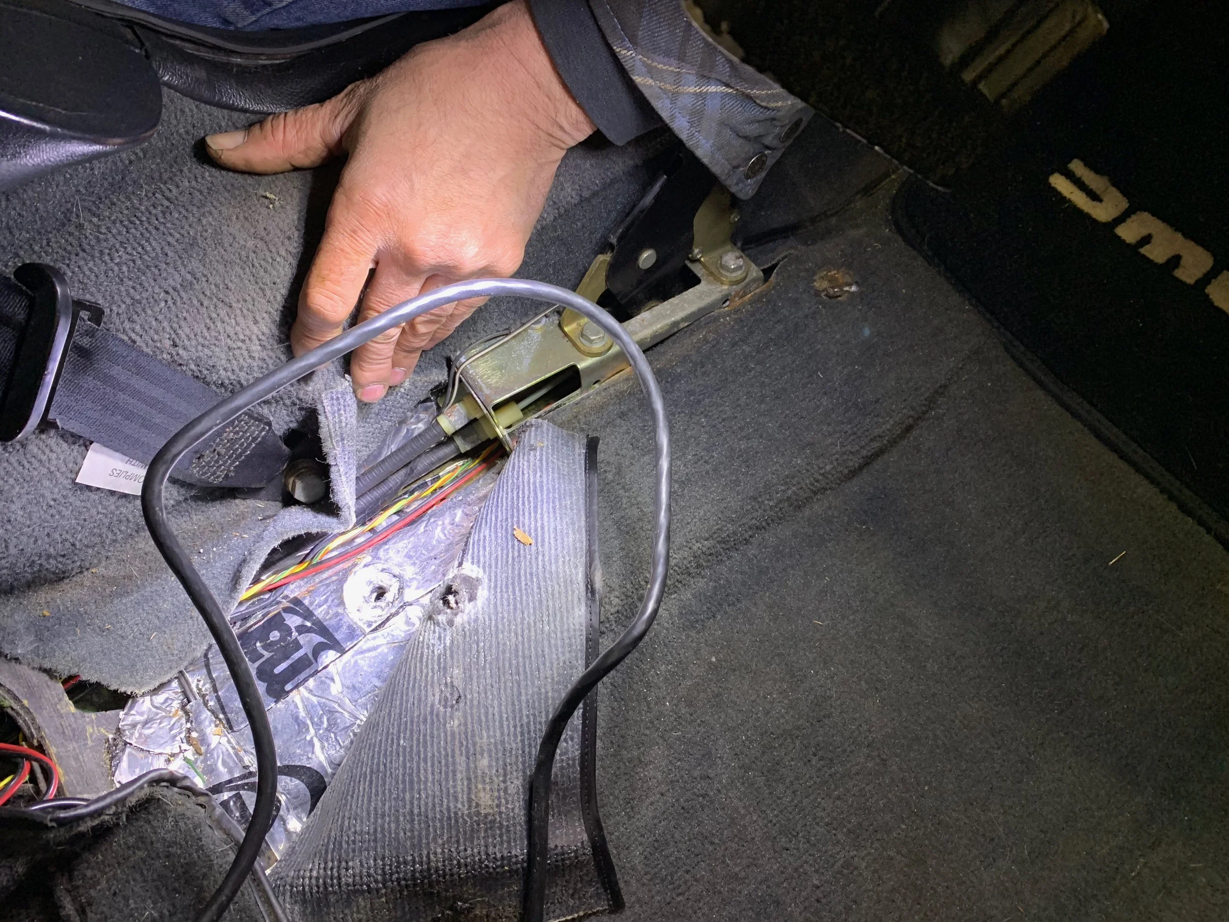The original hand brake cables connected to the brake lever.