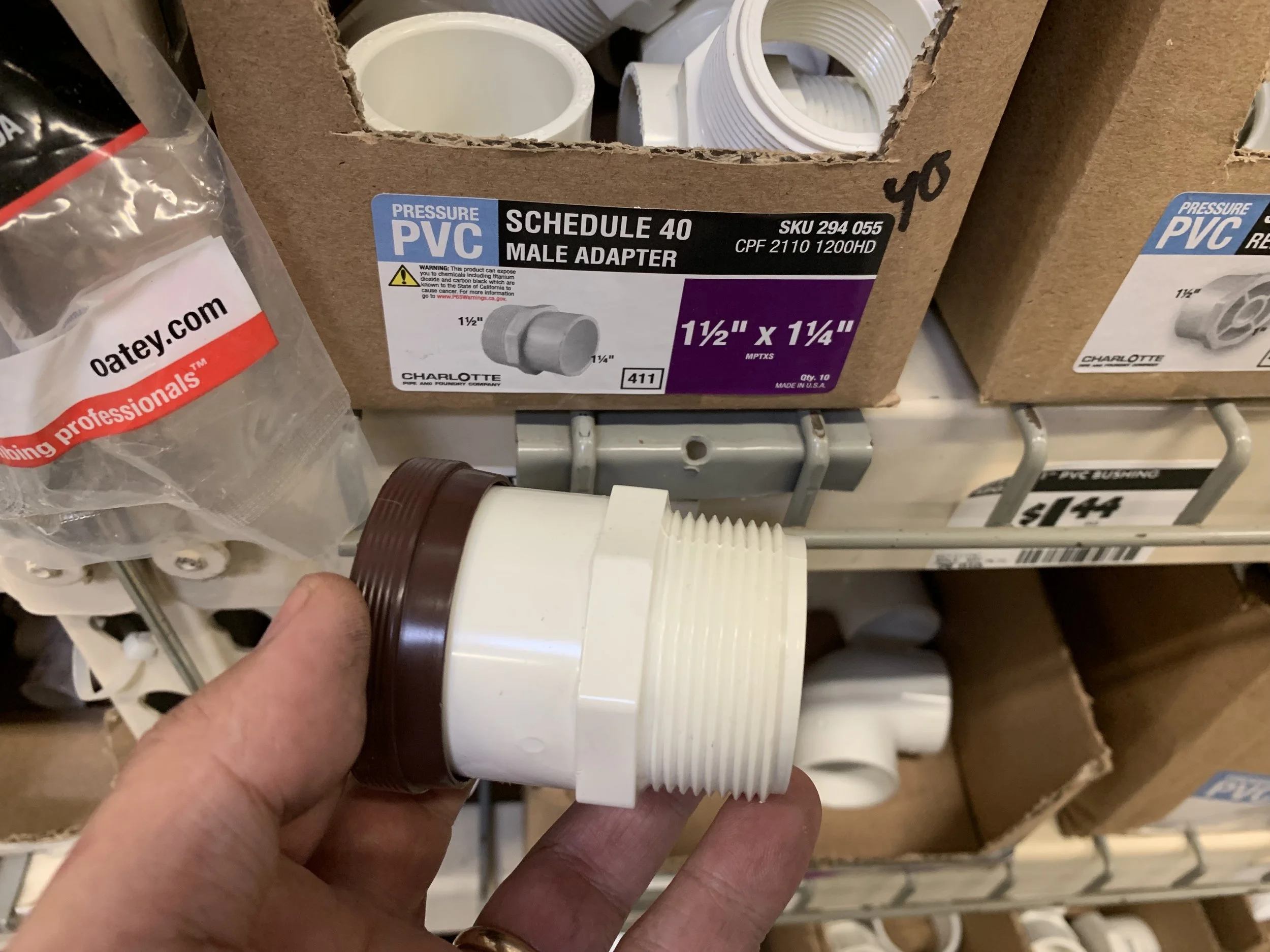 Sourcing a piece of PVC pipe as a guide for tapping the seal into the transmission.