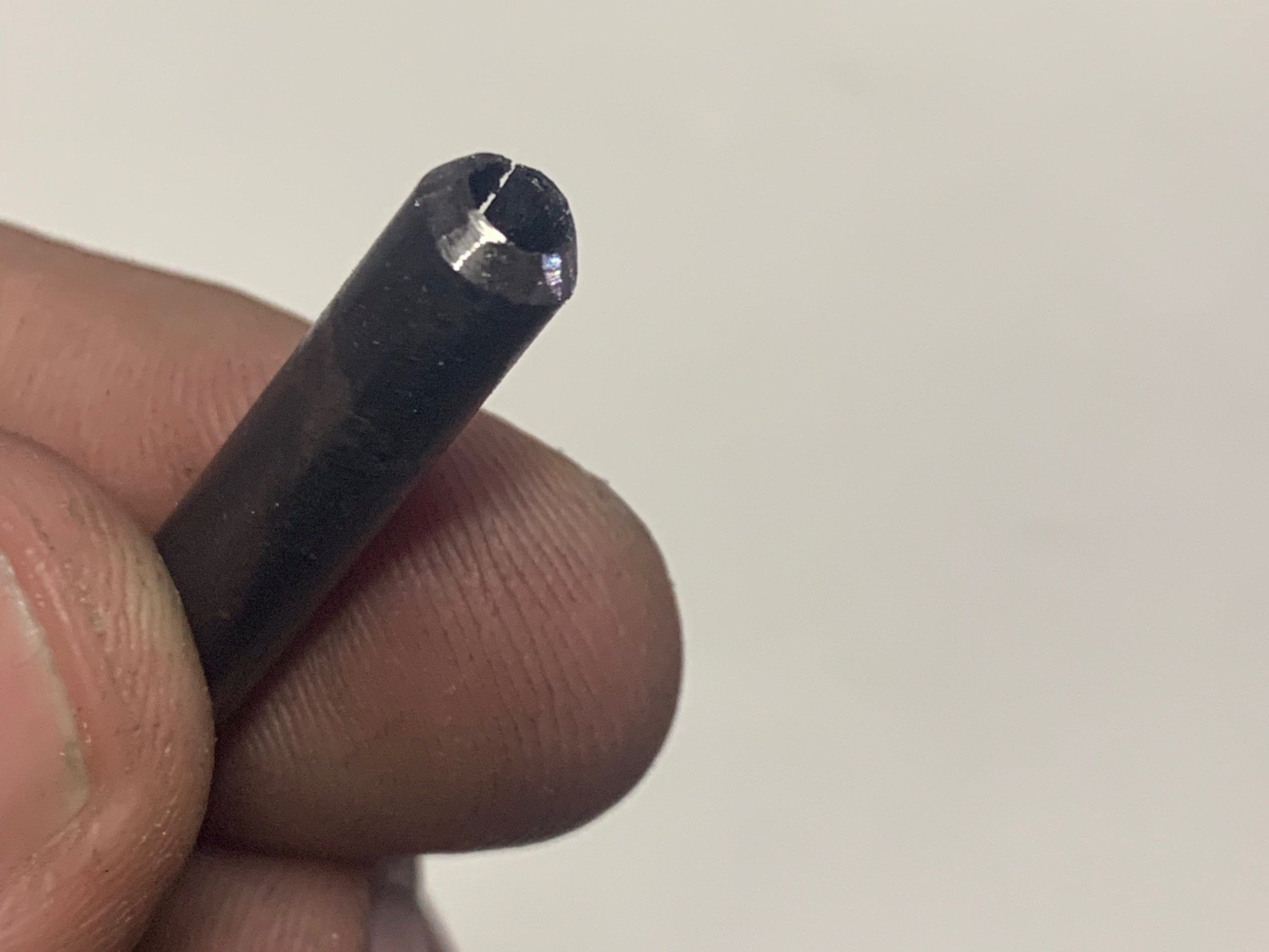 The new roll pin after tapering the end to make it a little easier to fit into the flange.