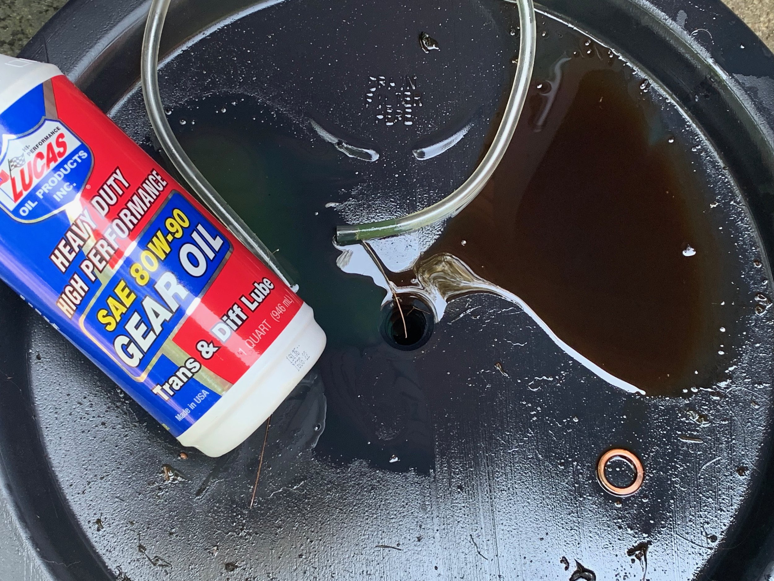 The 80W gear oil I used for the final drive. This is a lighter green color (left, top) than the brown oil that was in there before (right)