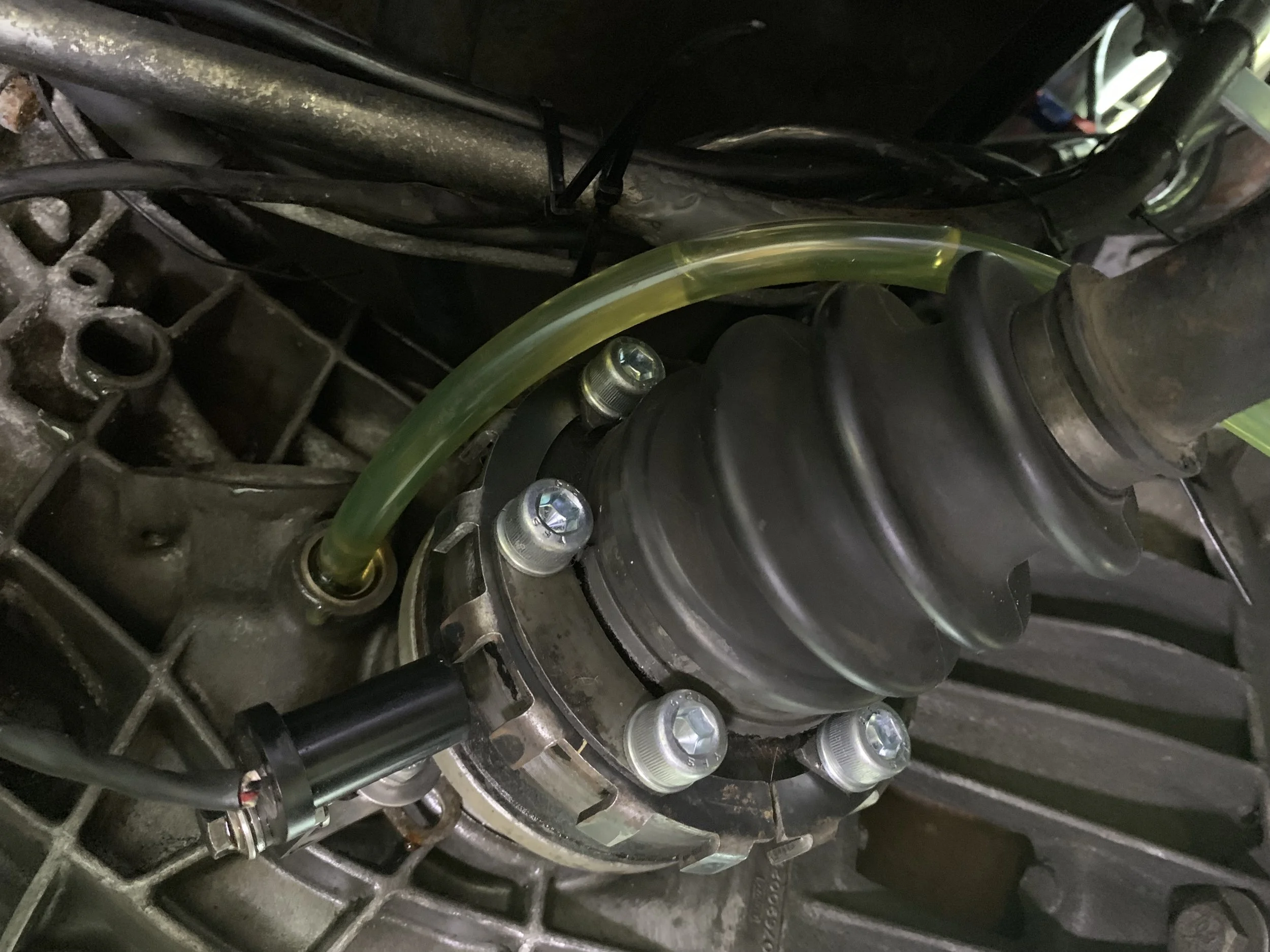 The other end of the hose runs into the fill hole in the final drive.