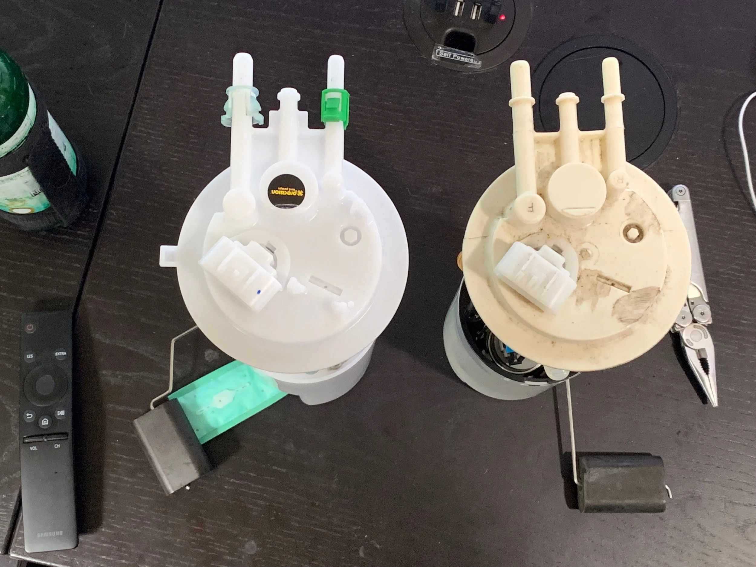 From the top you can clearly see how the sender arms point in different directions, necessitating a different orientation in the tank to clear the sides and the ground wire.