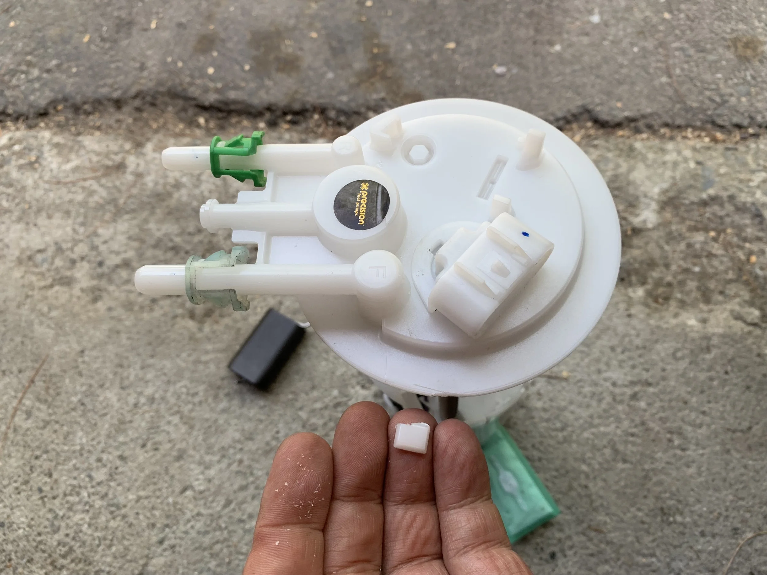 There’s a plastic alignment tab on the Tahoe pump that interferes with the clamp and needs to be removed (that, or you can notch the tank lip, but I decided to just saw it off).