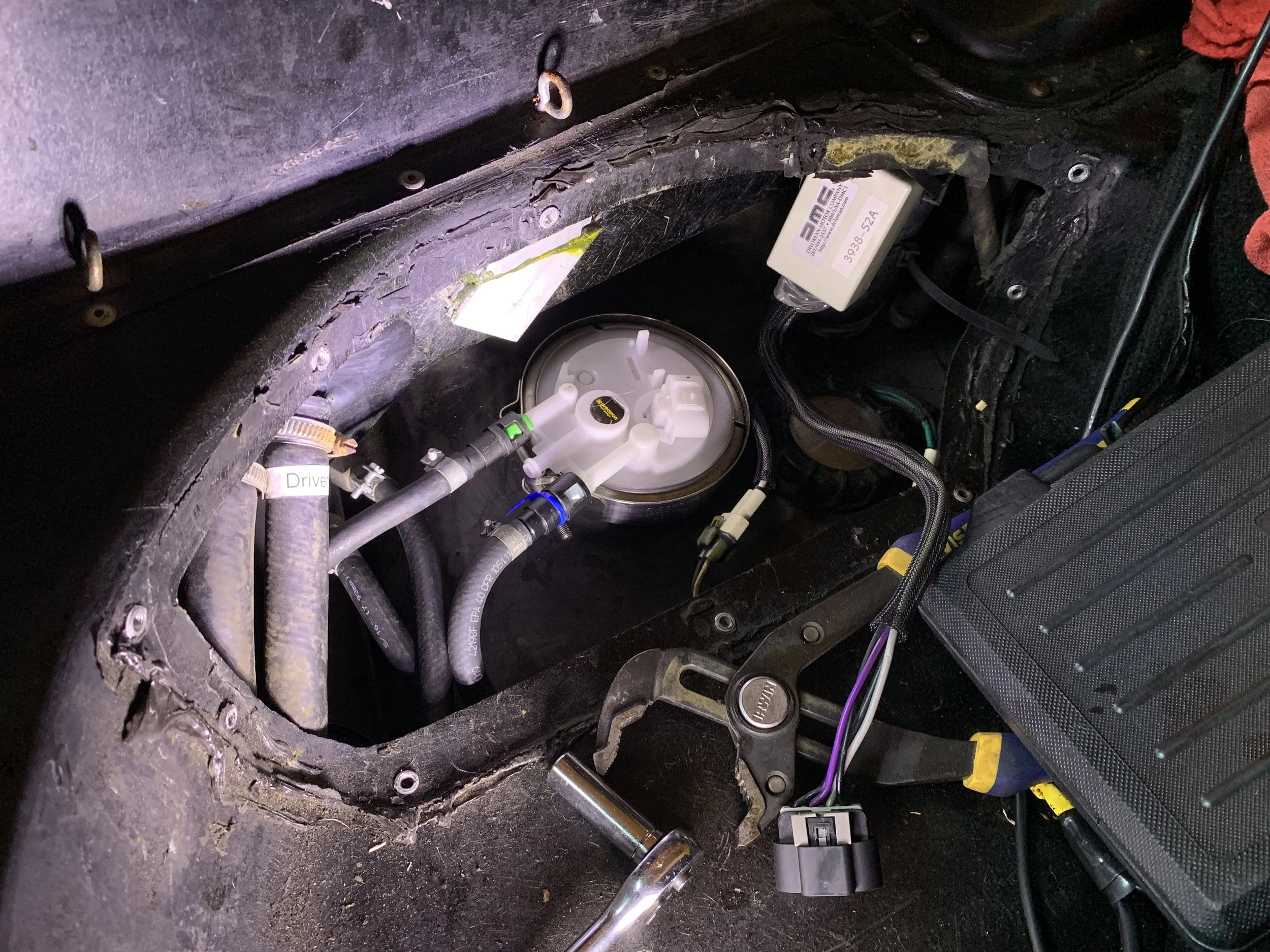 Final installation, save for the electronically connection, with the sender arm aiming towards the back of the tank. Note that the access panel does not fit in this configuration. Also note that there is a ground wire running along the driver’s side of the tank, so the arm can’t point hat way either.