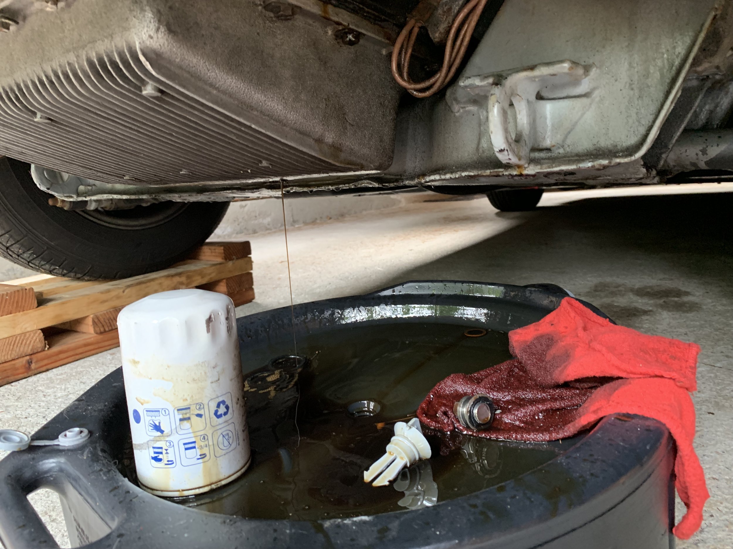 The oil mostly drained and the oil filter removed.
