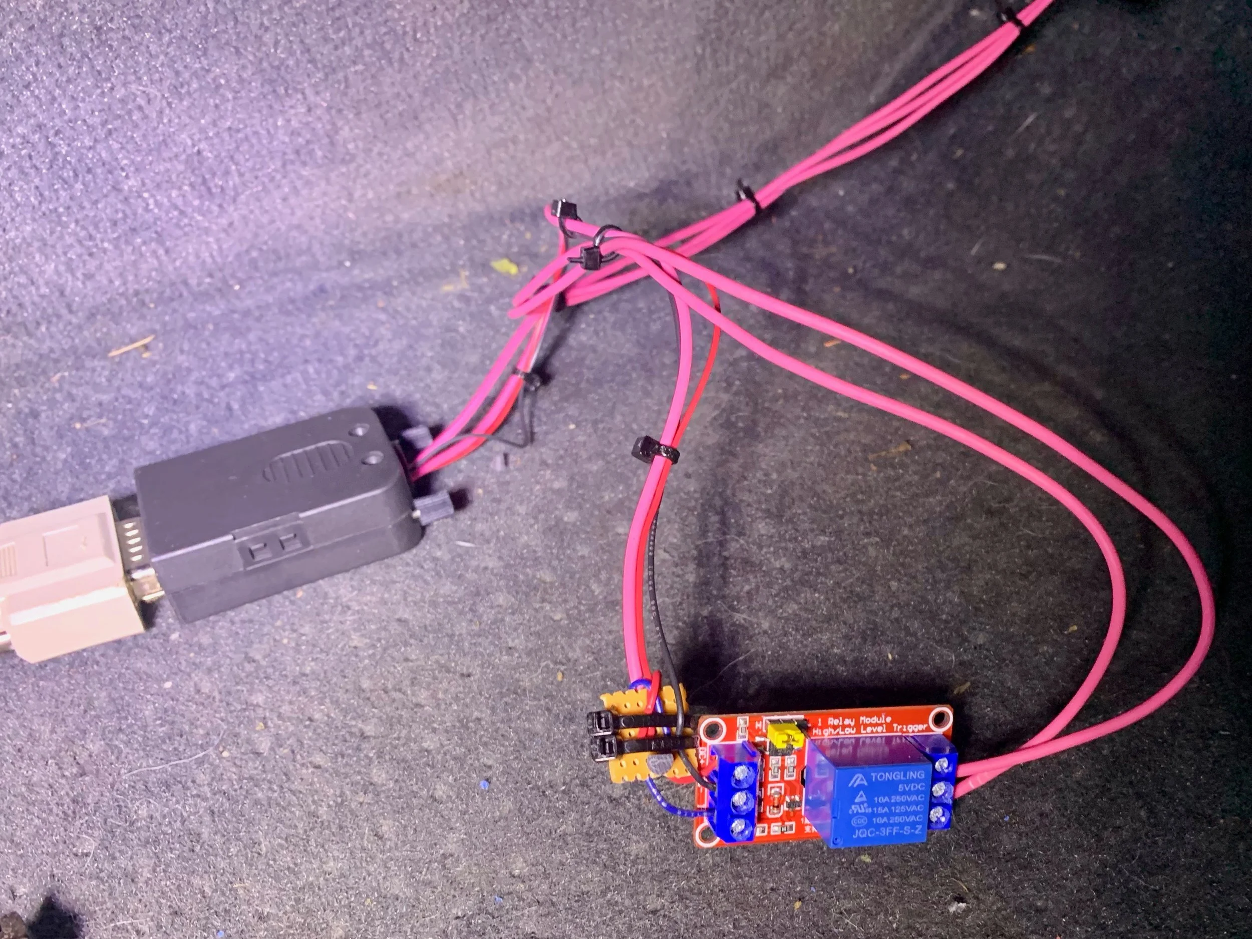 A closer view of the relay board and transistor, which will eventually be put in a 3D printed case, but which could be just wrapped in tape instead.