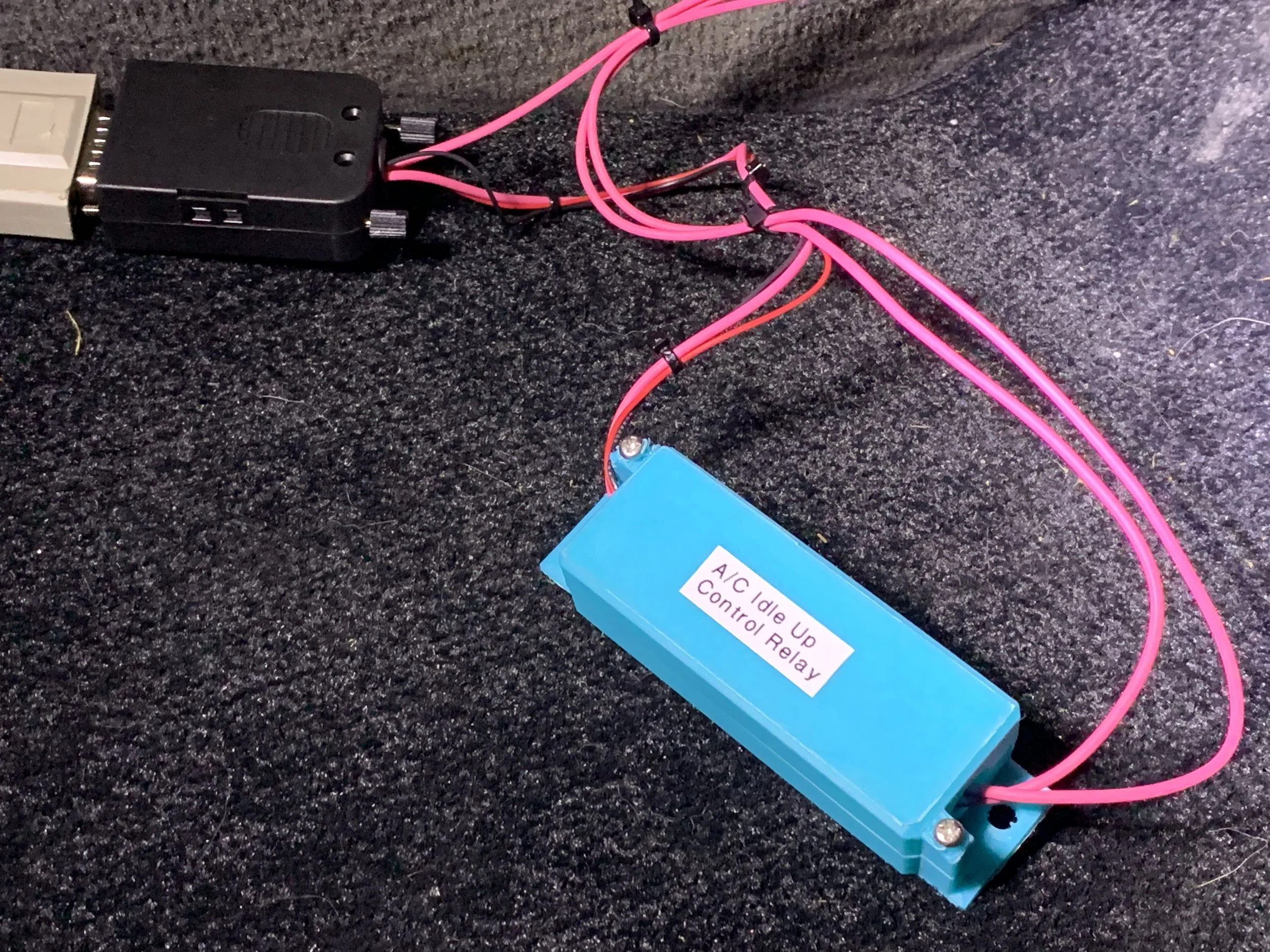 The closed box with the relay and transistor inside, and a label so I remember what it is.