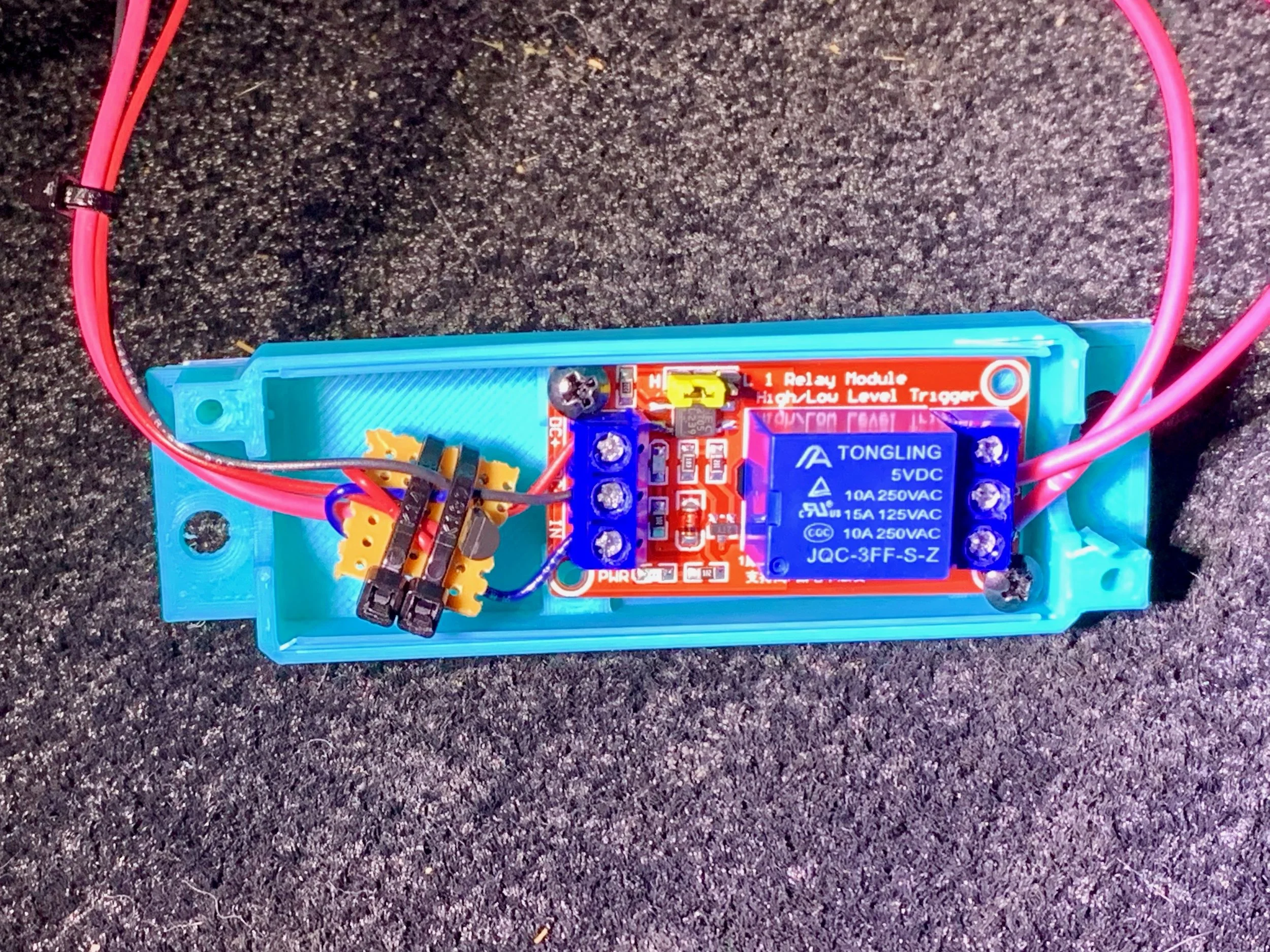 The relay board screwed into the case. The transistor board just floats freely inside.