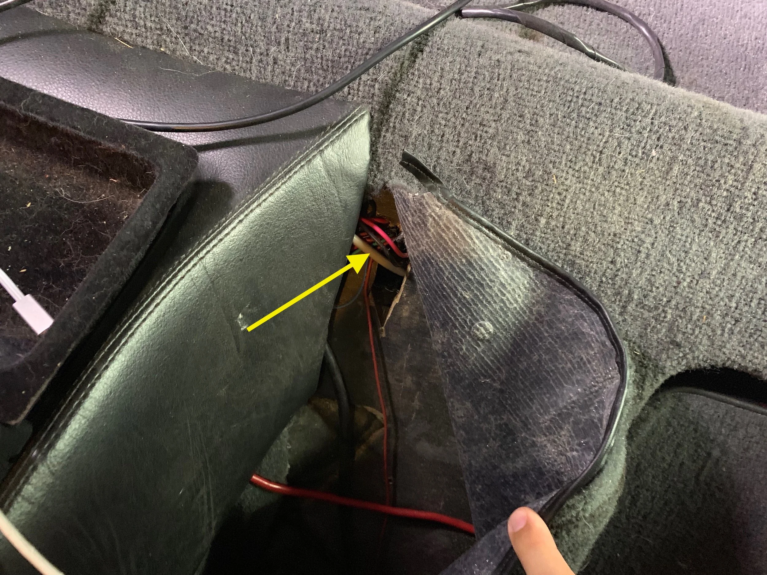 Routing of the grey DB15 cable. A rectangular hole had to be cut to fit the large connector through the wood panel.