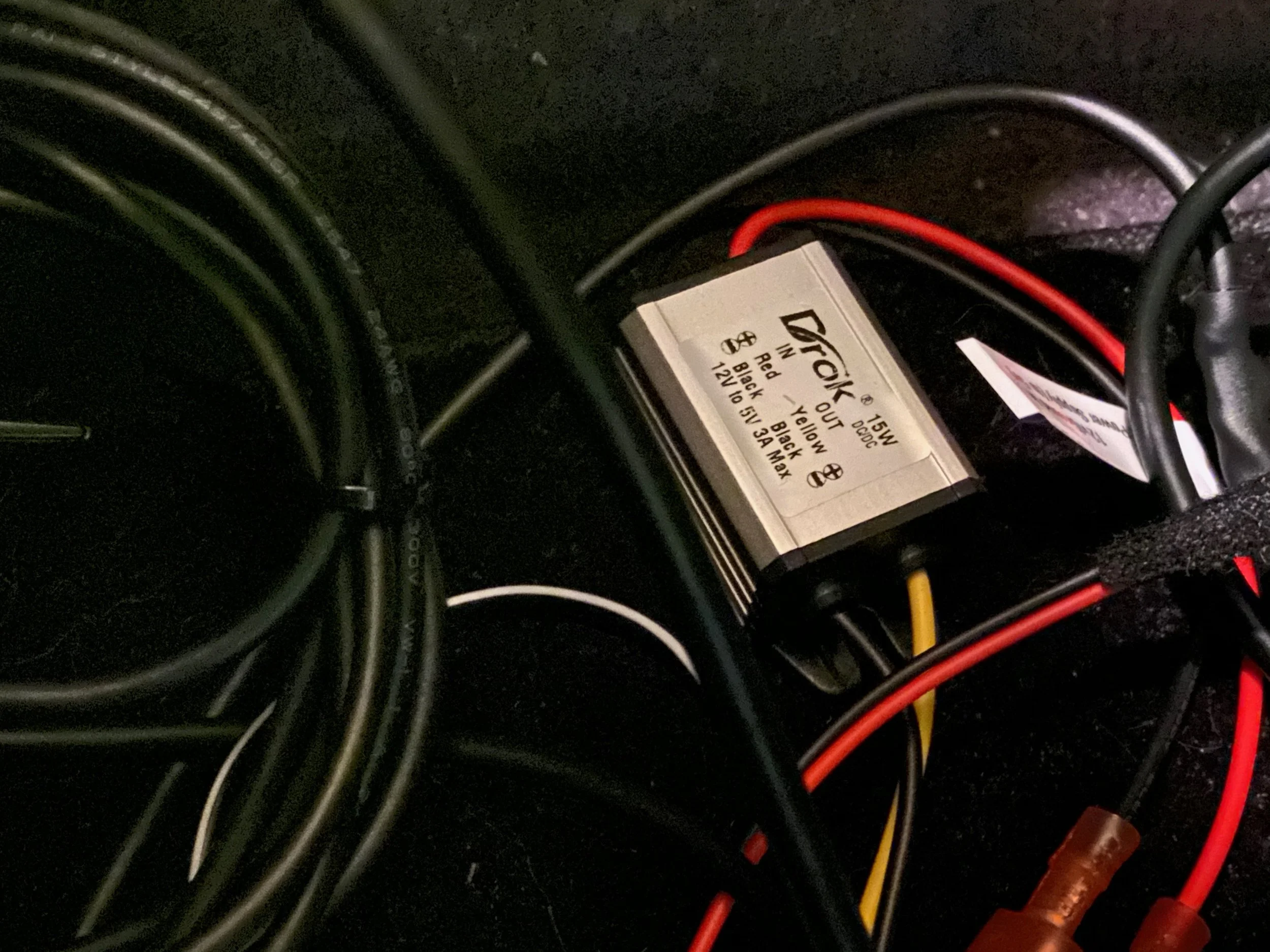 The 12v to 5v buck power supply that powers the Arduino, display and Hall sensor.
