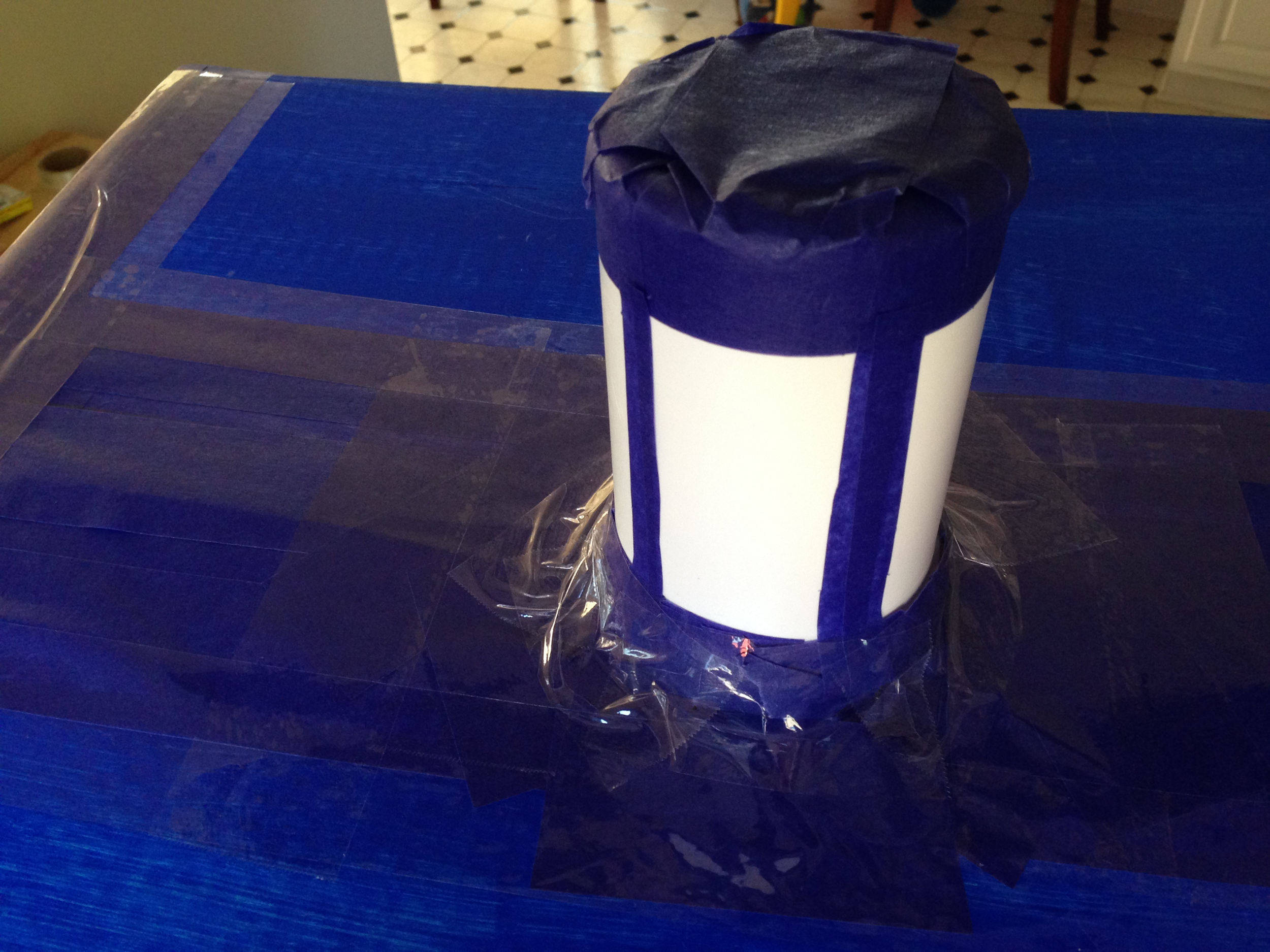 As you can see, the painter's tape isn't made to stick permanently and will start to pull away. That's another reason for the final packing tape layer mentioned in Step 14.