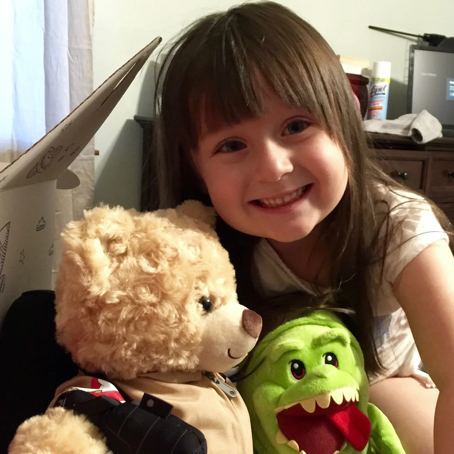Penelope saved up her allowance to buy a new bear with the Ghostbusters jumpsuit and proton pack, along with Slimer. She named her bear Dr. Jillian Holtzmann.