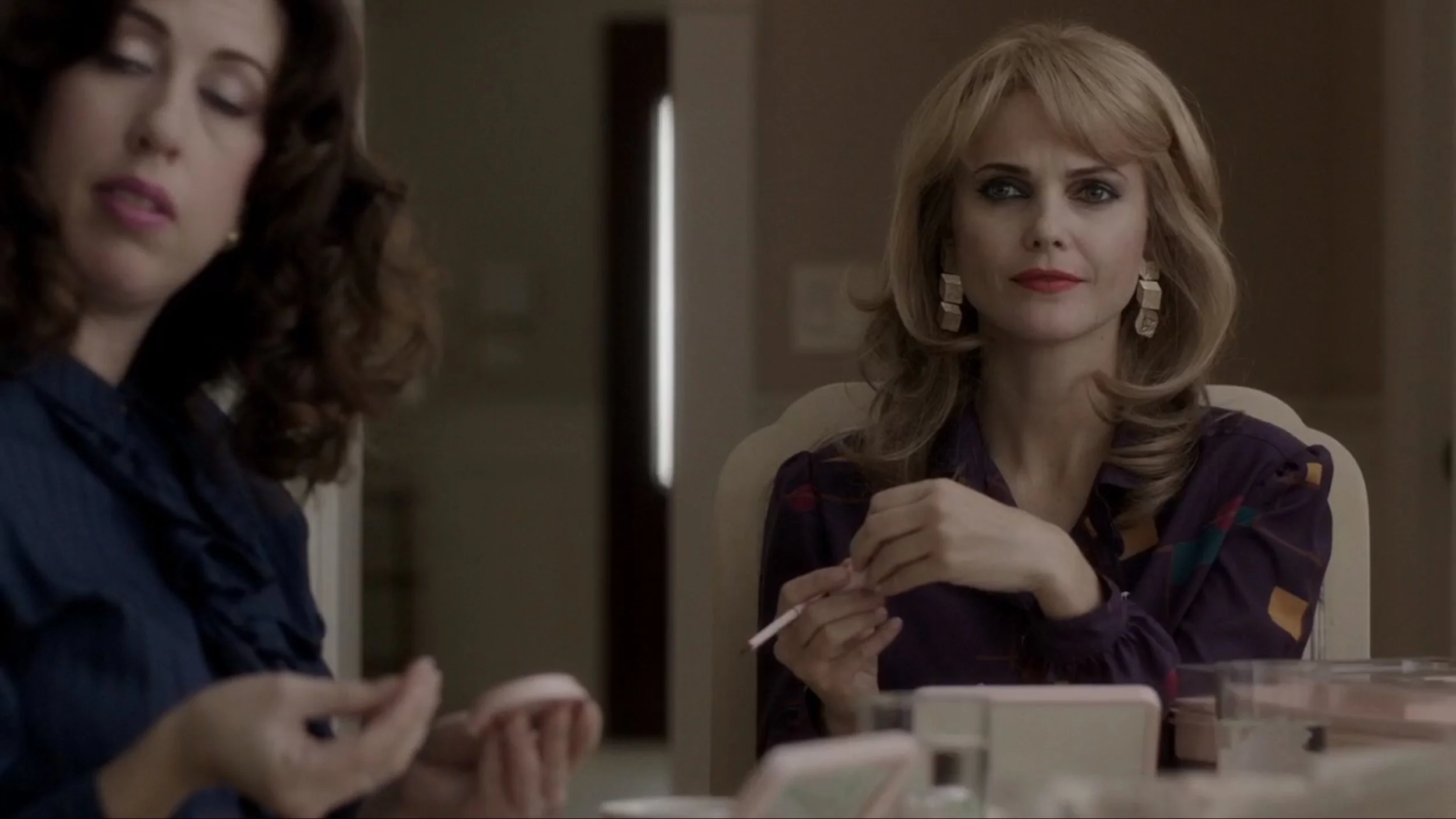 Elizabeth looks appropriately skeptical about this Mary Kay thing