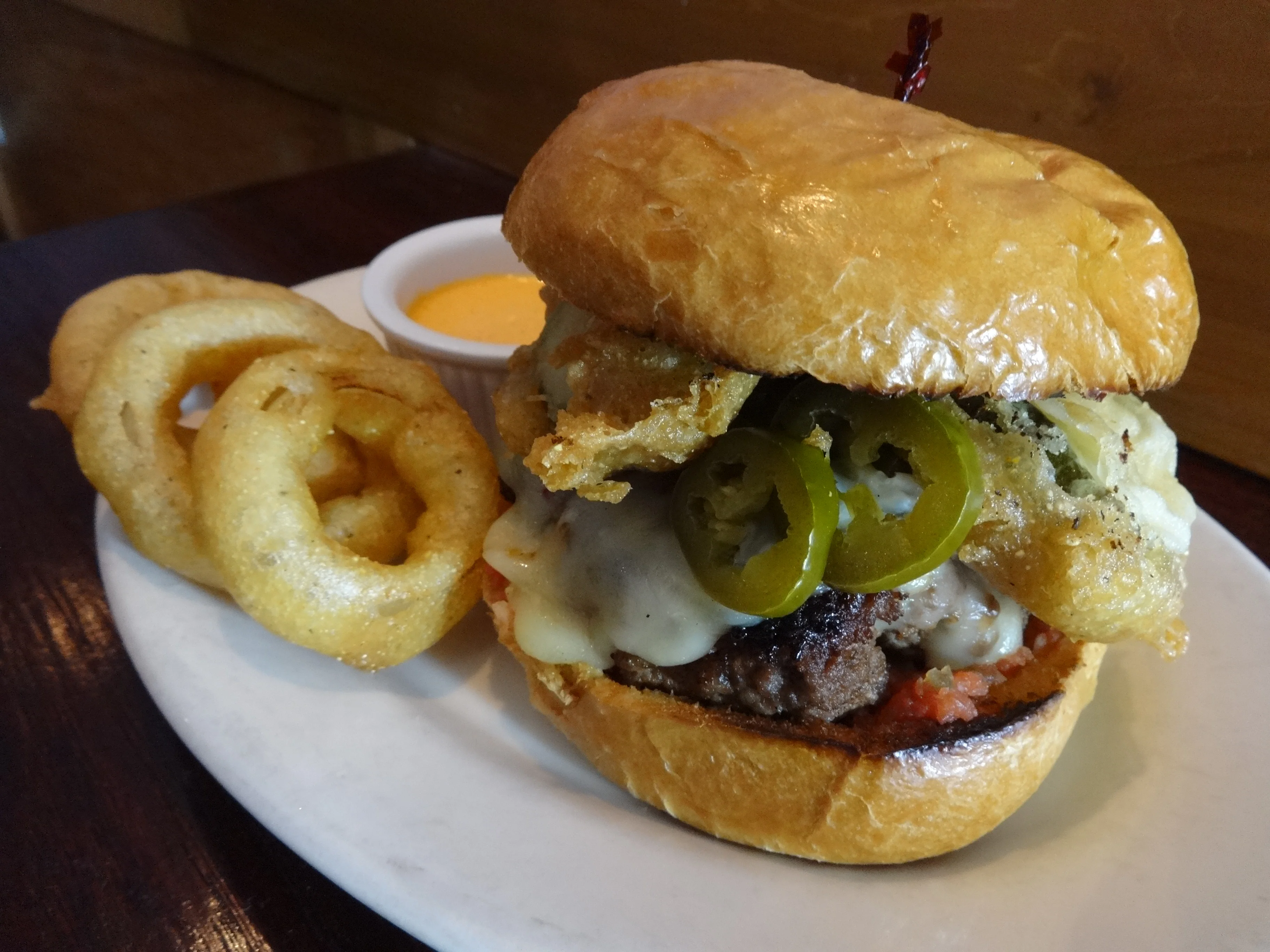 Nick's Roast Beef Debuts New Bacon Burger with Bespoke Bacon