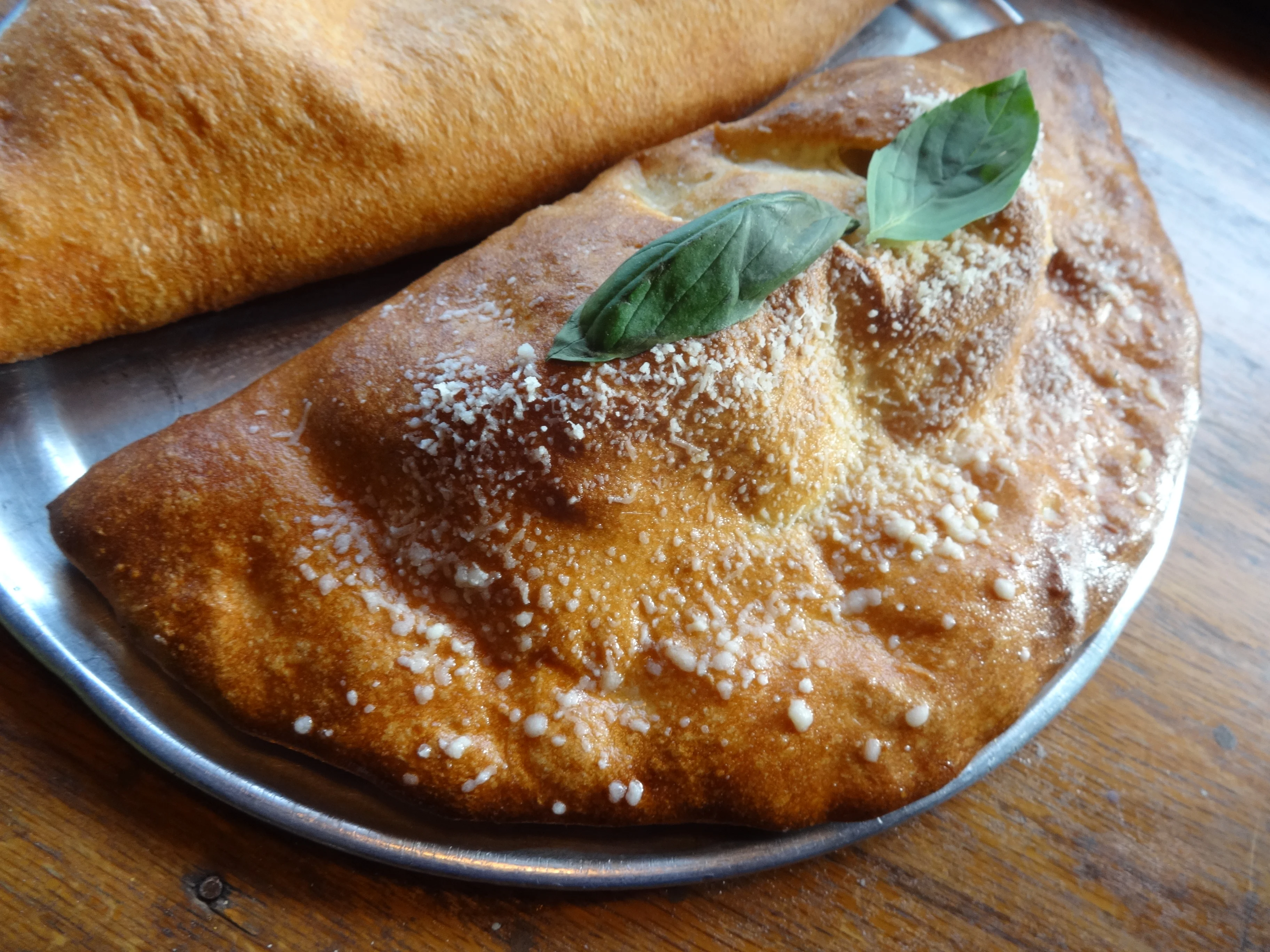 SliCE Debuts Shrimp Scampi Pizza for Lent, St Patrick's Twist on Pizza, Plus New Deep Fried Calzone